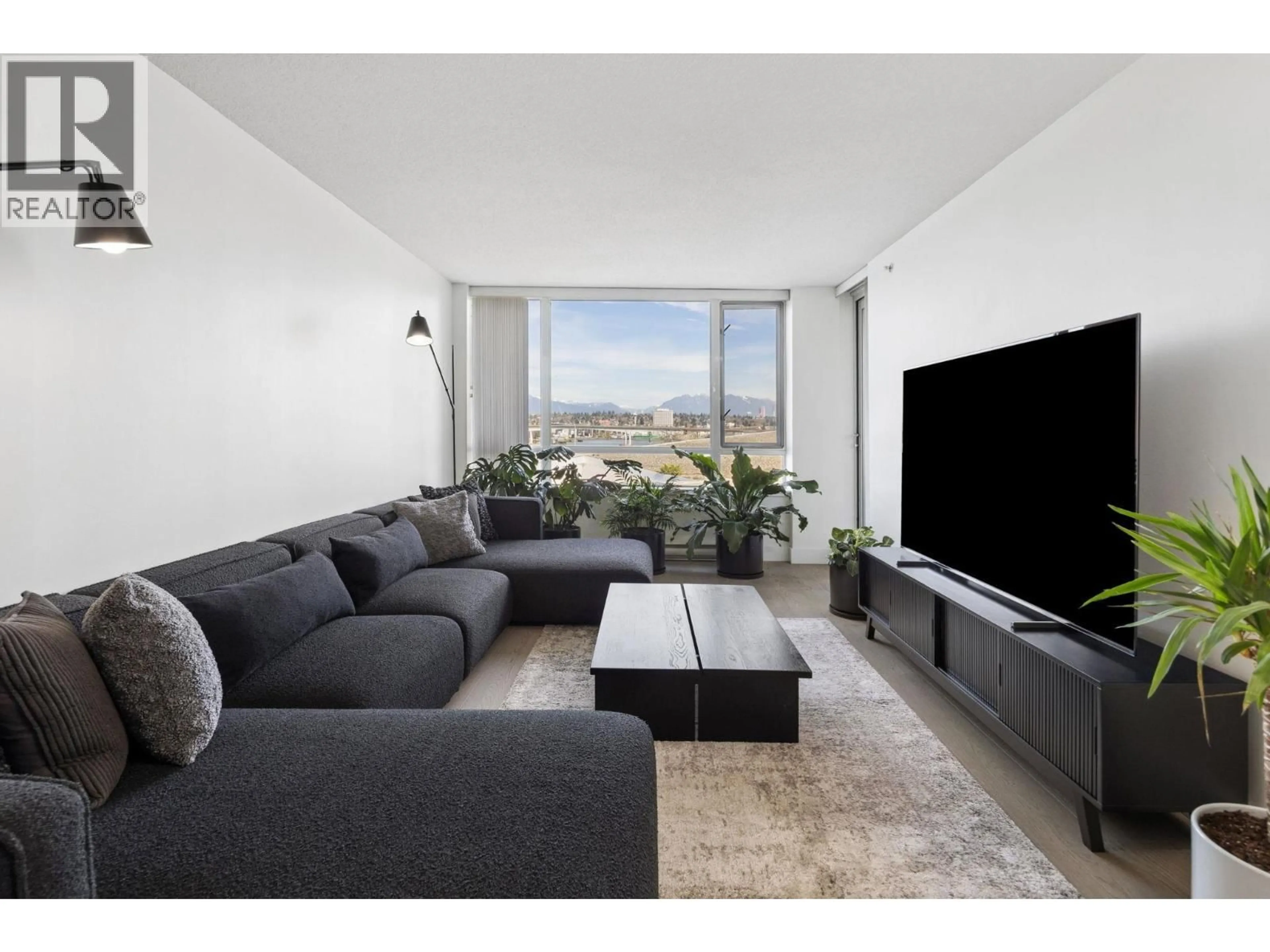 Living room with furniture, unknown for 701 - 3333 CORVETTE WAY, Richmond British Columbia V6X0E3