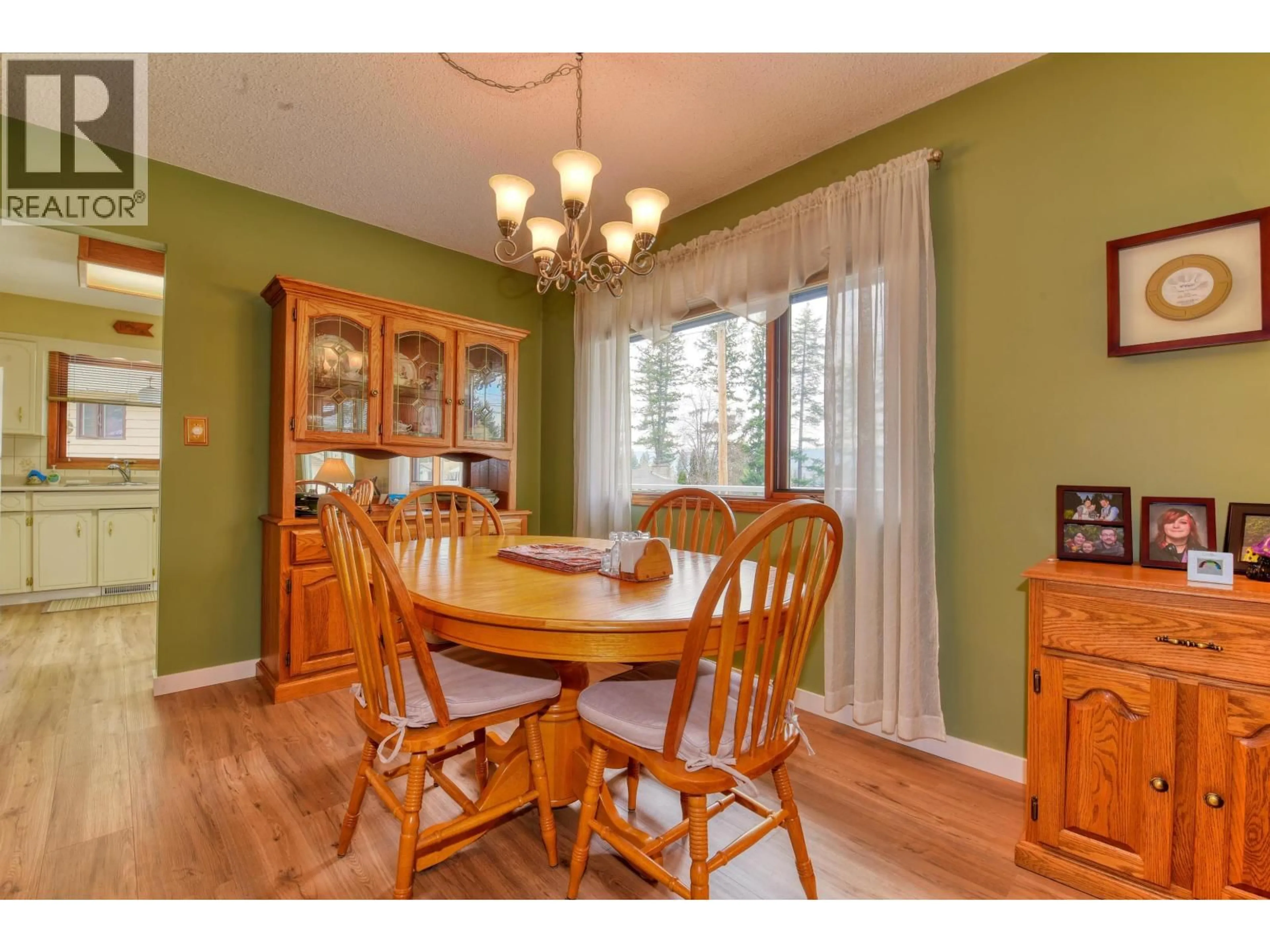 Dining room, wood/laminate floor for 1220 CLARKE AVENUE, Williams Lake British Columbia V2G2N5