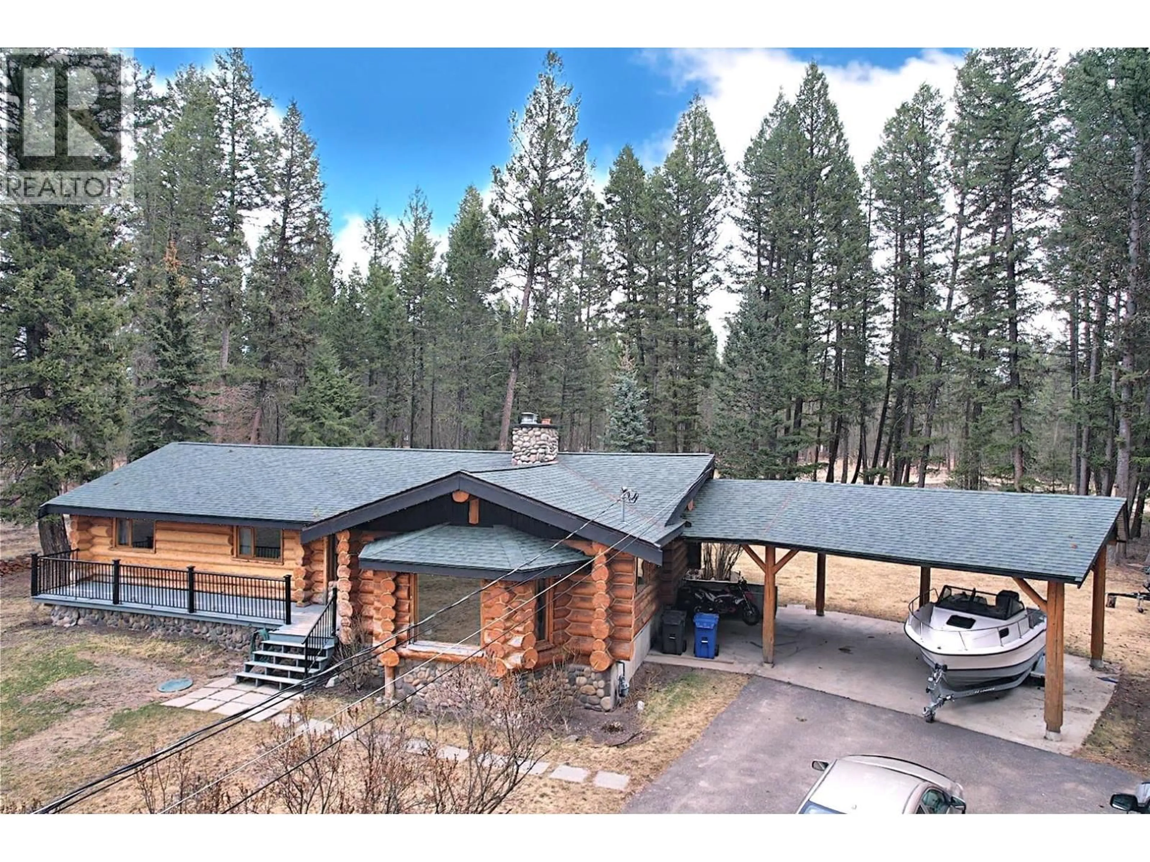 A pic from outside/outdoor area/front of a property/back of a property/a pic from drone, unknown for 5007 CANIUM COURT, 108 Mile Ranch British Columbia V0K2Z0