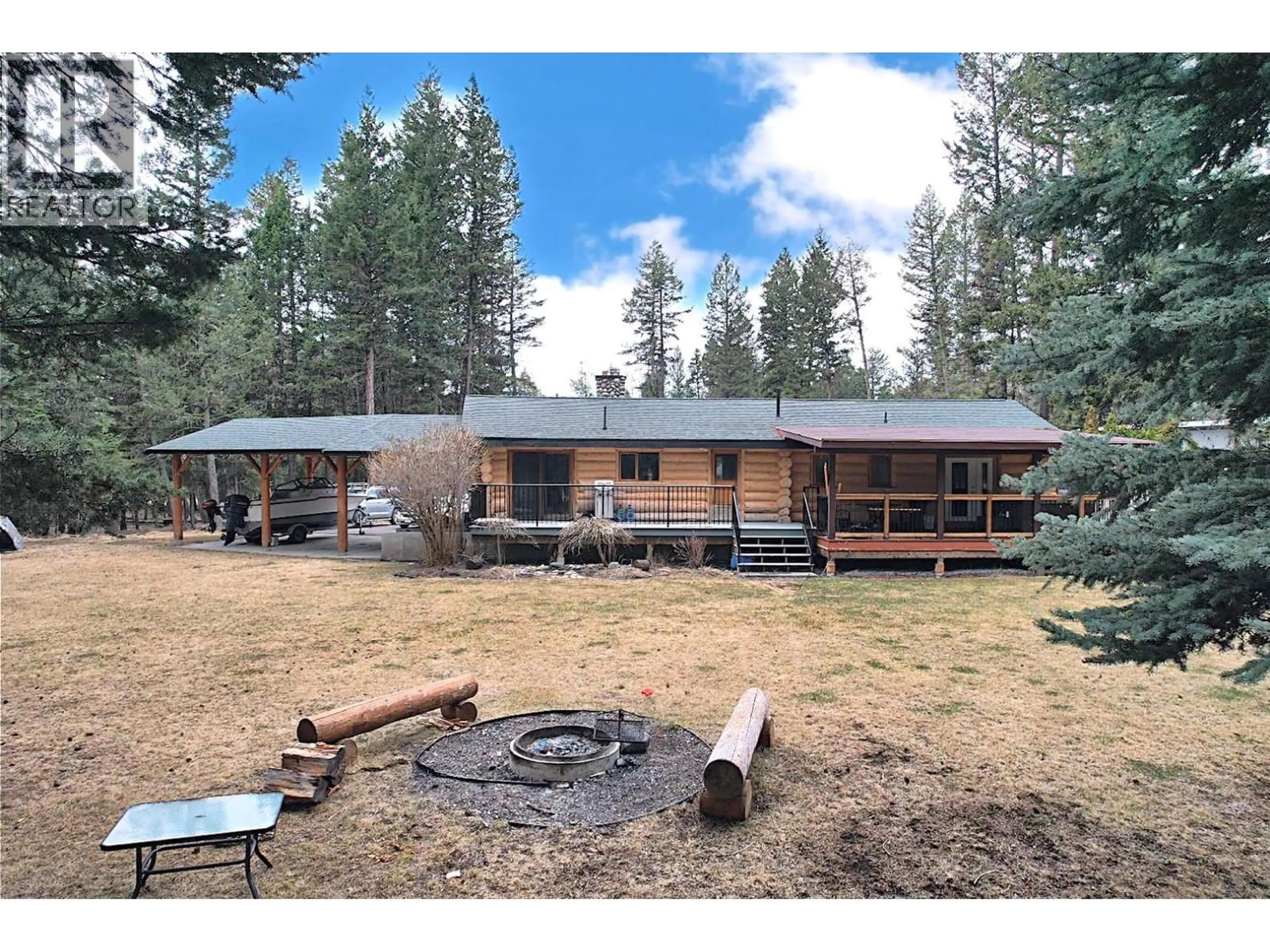 A pic from outside/outdoor area/front of a property/back of a property/a pic from drone, mountain view for 5007 CANIUM COURT, 108 Mile Ranch British Columbia V0K2Z0
