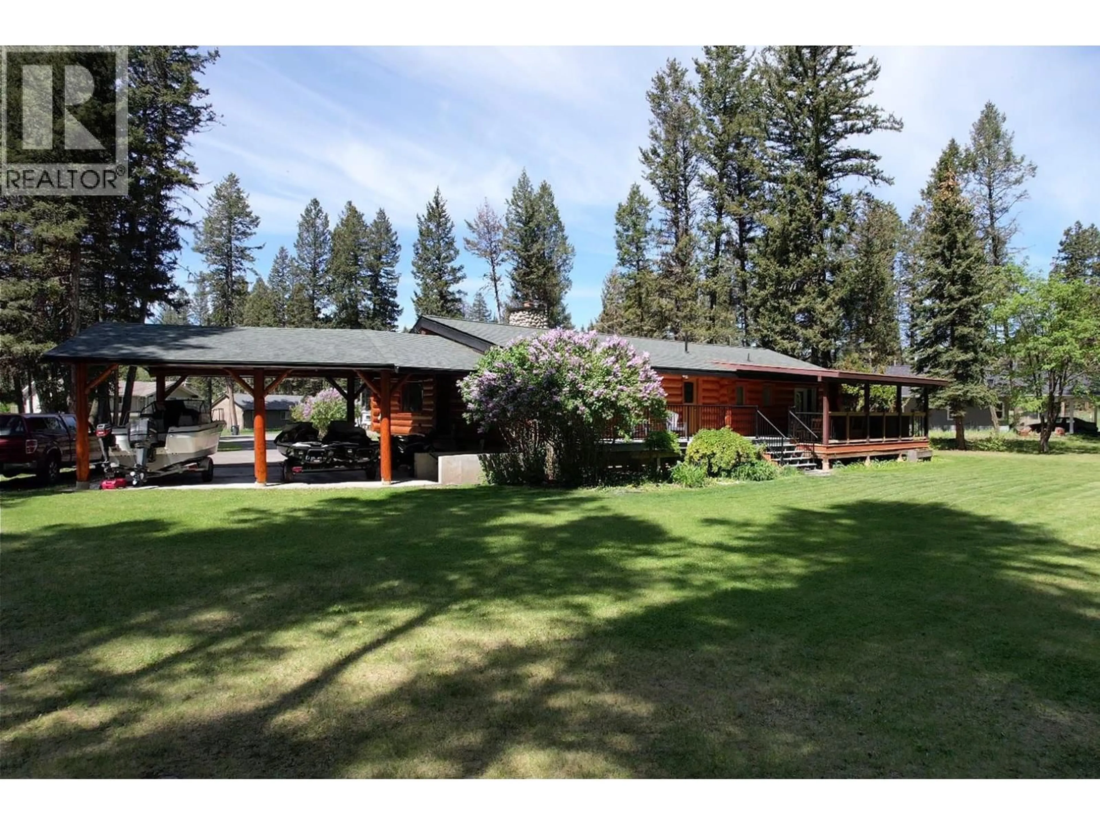 A pic from outside/outdoor area/front of a property/back of a property/a pic from drone, mountain view for 5007 CANIUM COURT, 108 Mile Ranch British Columbia V0K2Z0
