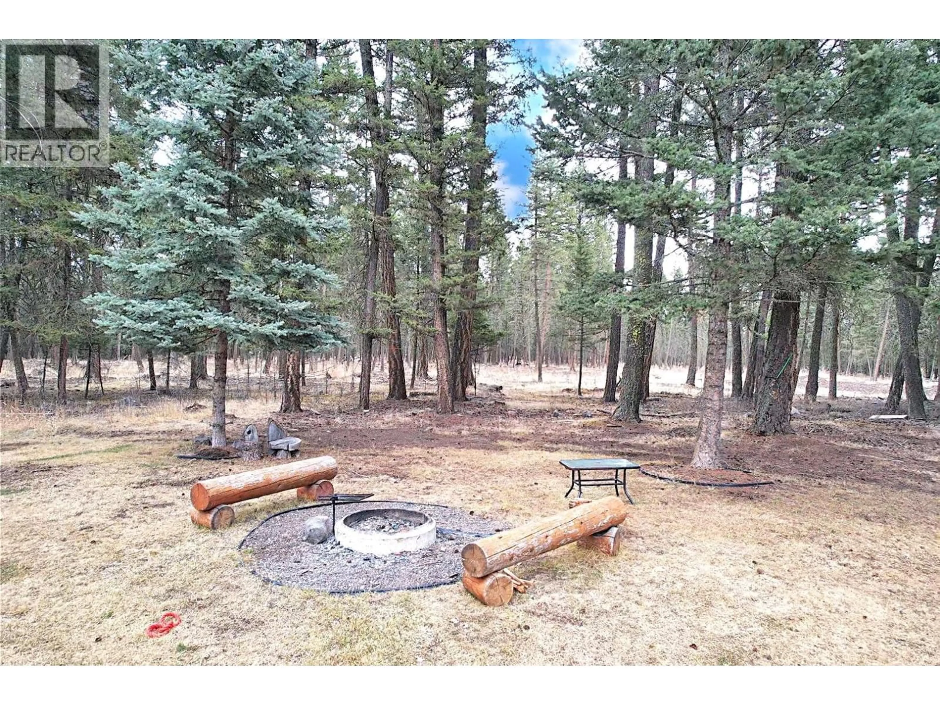Patio, forest/trees view for 5007 CANIUM COURT, 108 Mile Ranch British Columbia V0K2Z0