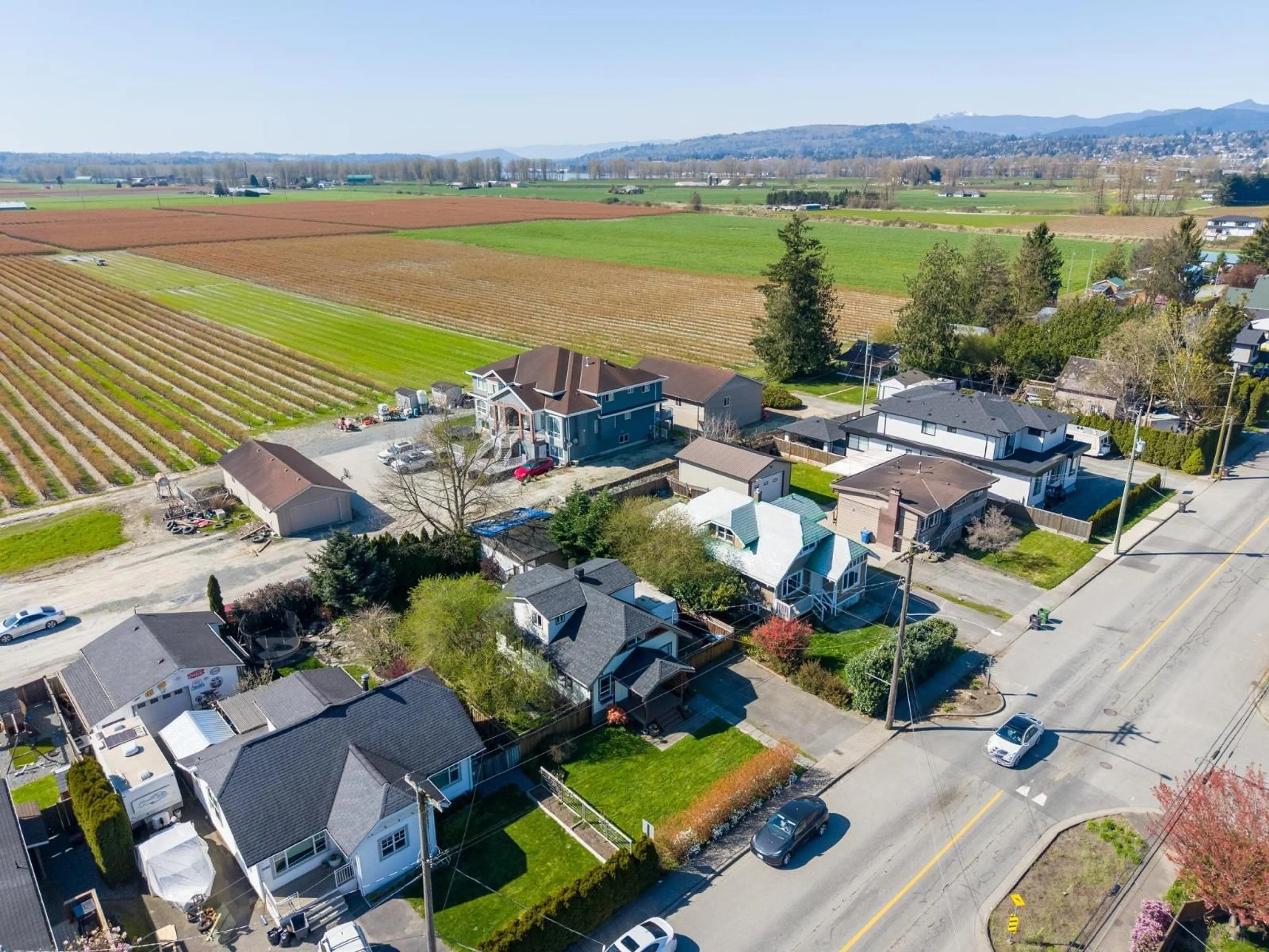 A pic from outside/outdoor area/front of a property/back of a property/a pic from drone, street for 5695 RIVERSIDE STREET, Abbotsford British Columbia V4X1T4