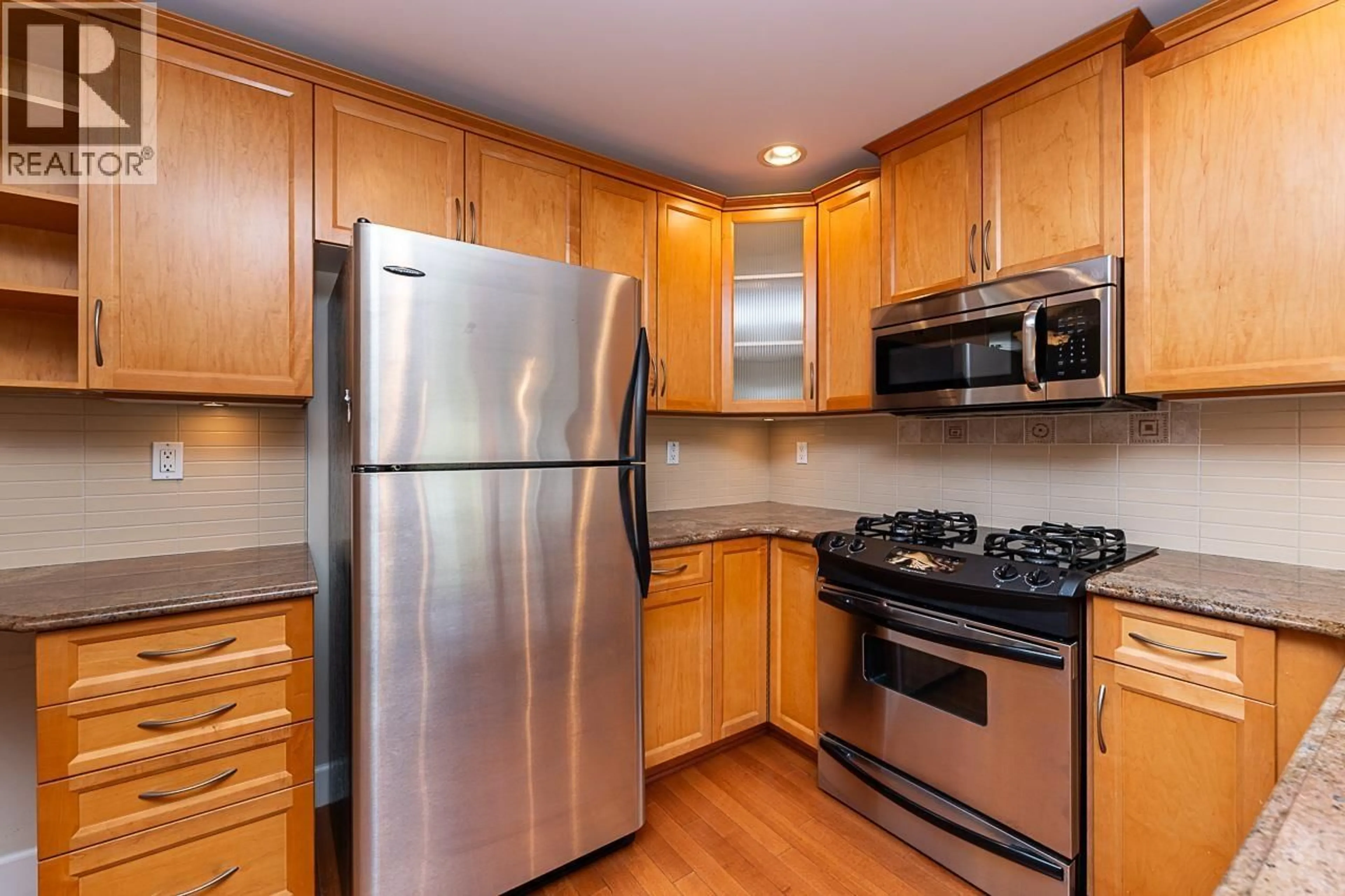Standard kitchen, wood/laminate floor for 203 - 2103 45TH AVENUE, Vancouver British Columbia V6M2J2