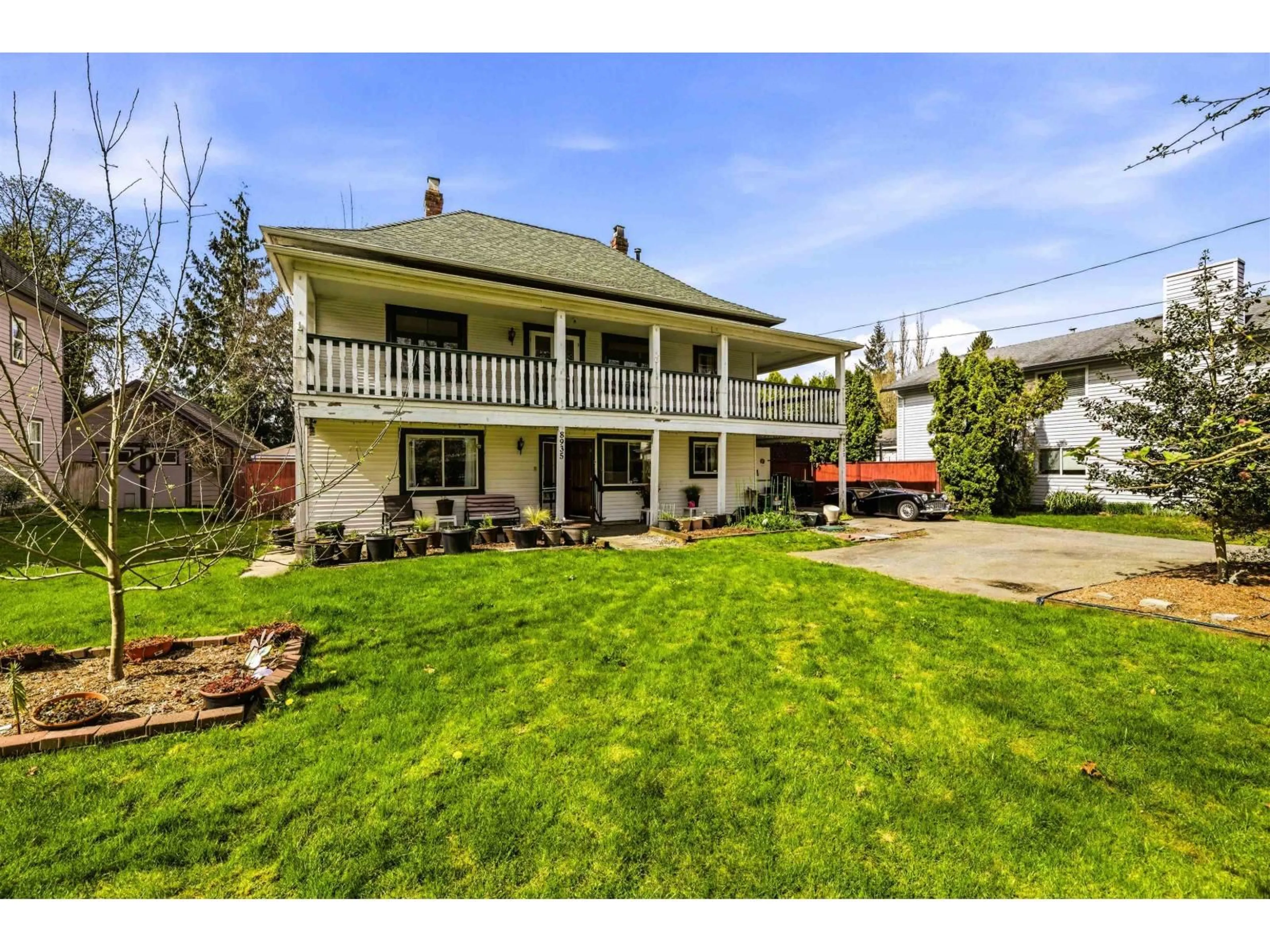 A pic from outside/outdoor area/front of a property/back of a property/a pic from drone, street for 8935 GLOVER ROAD, Langley British Columbia V1M2S2