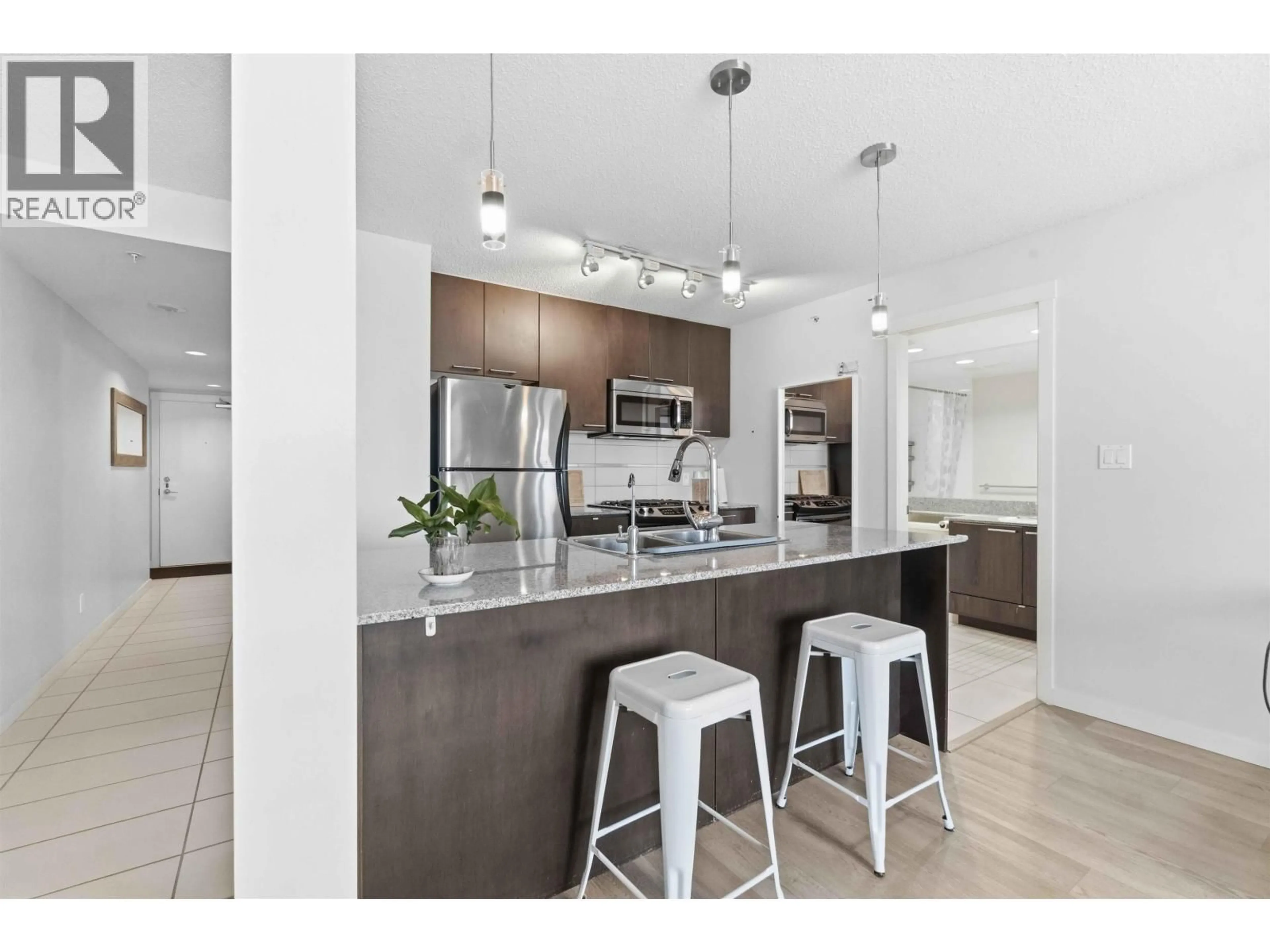 Open concept kitchen, ceramic/tile floor for 1612 - 5811 NO. 3 ROAD, Richmond British Columbia V6X4L7