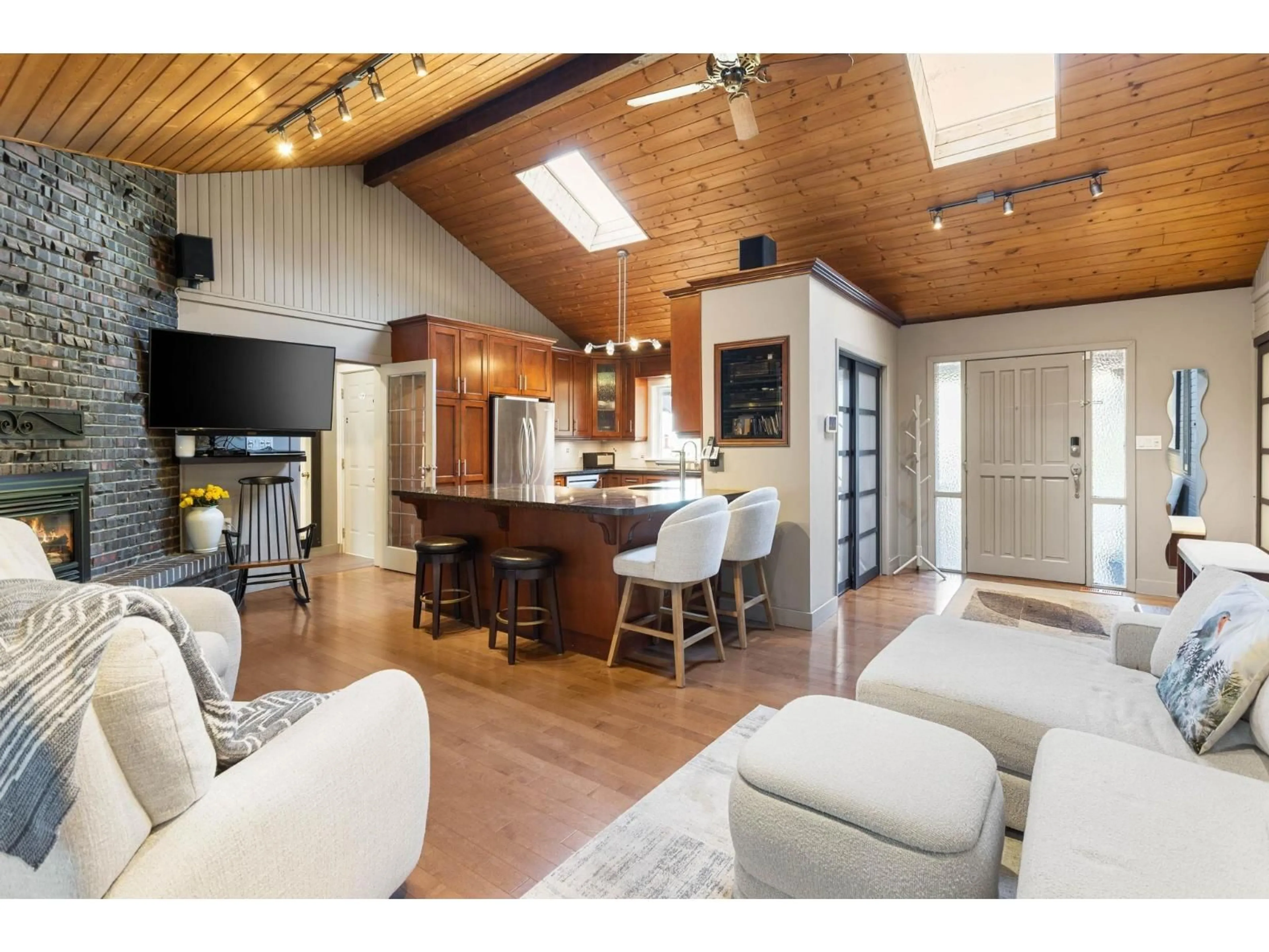 Open concept kitchen, wood/laminate floor for 23808 58A AVENUE, Langley British Columbia V2Z1A5