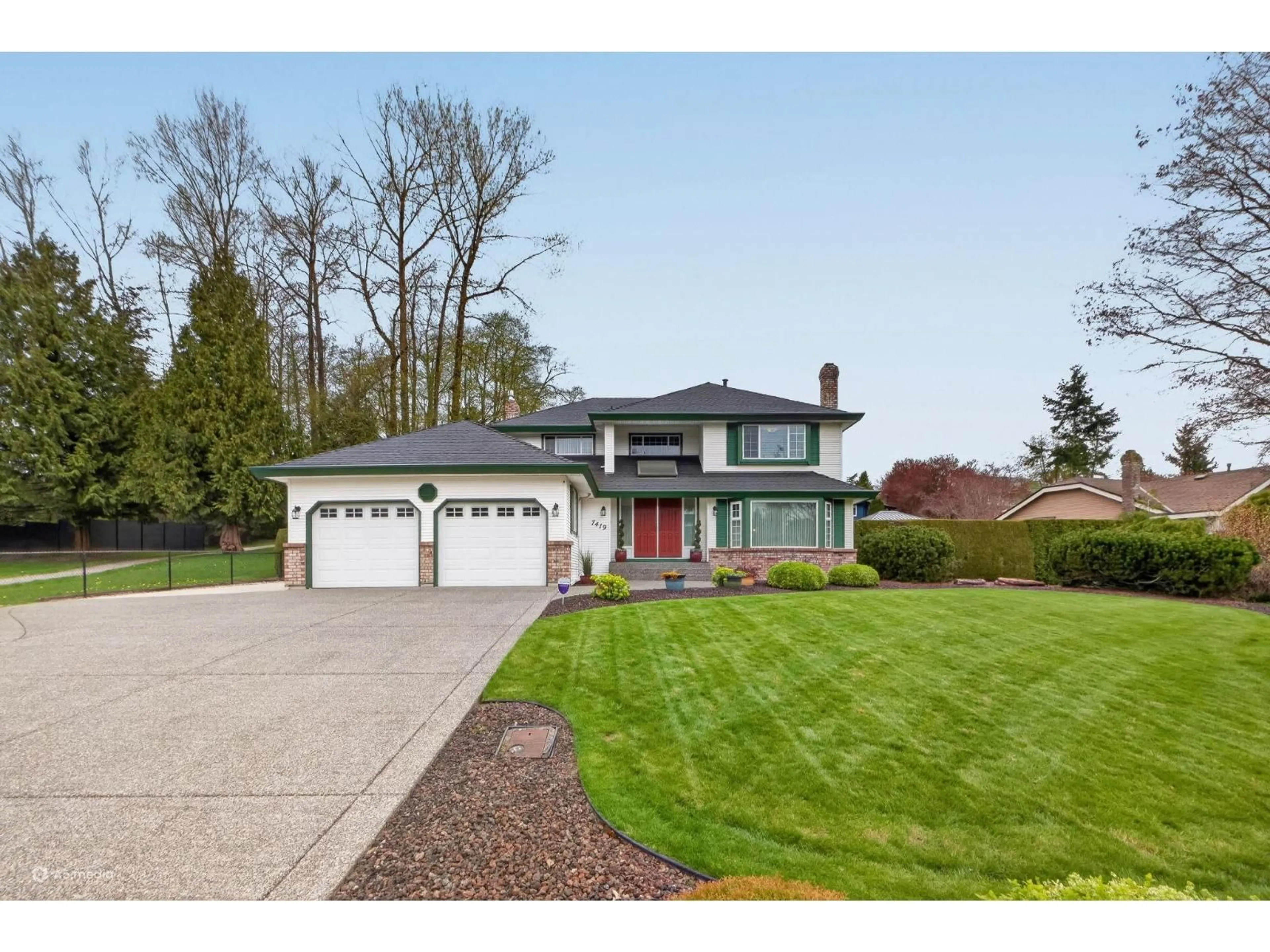 Home with vinyl exterior material, street for 7419 150A STREET, Surrey British Columbia V3S6Y8