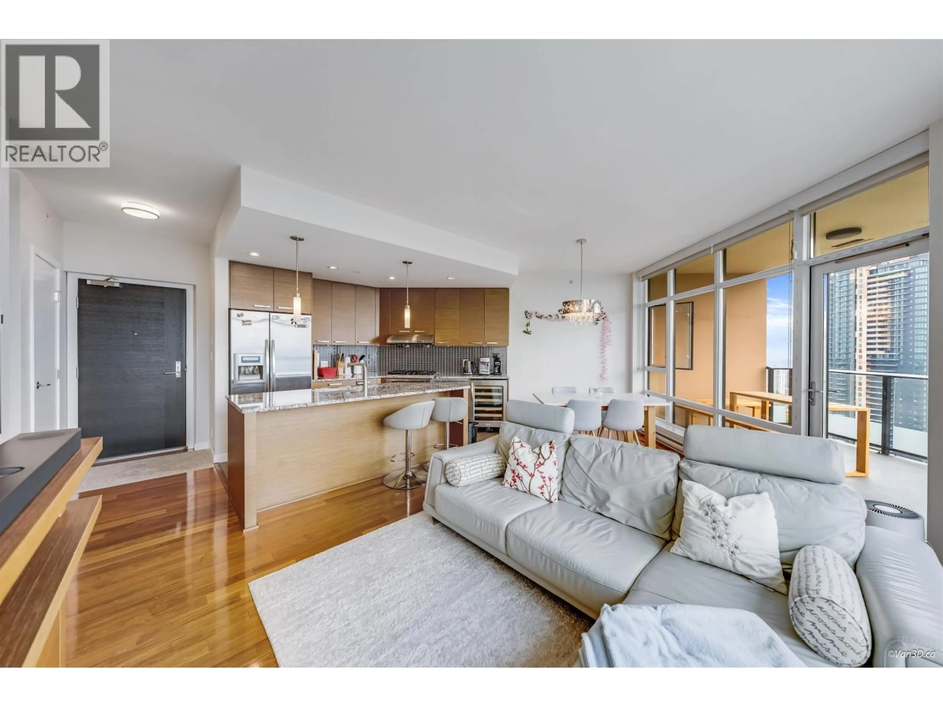 Open concept kitchen, wood/laminate floor for 2405 - 6188 WILSON AVENUE, Burnaby British Columbia V5H0A5