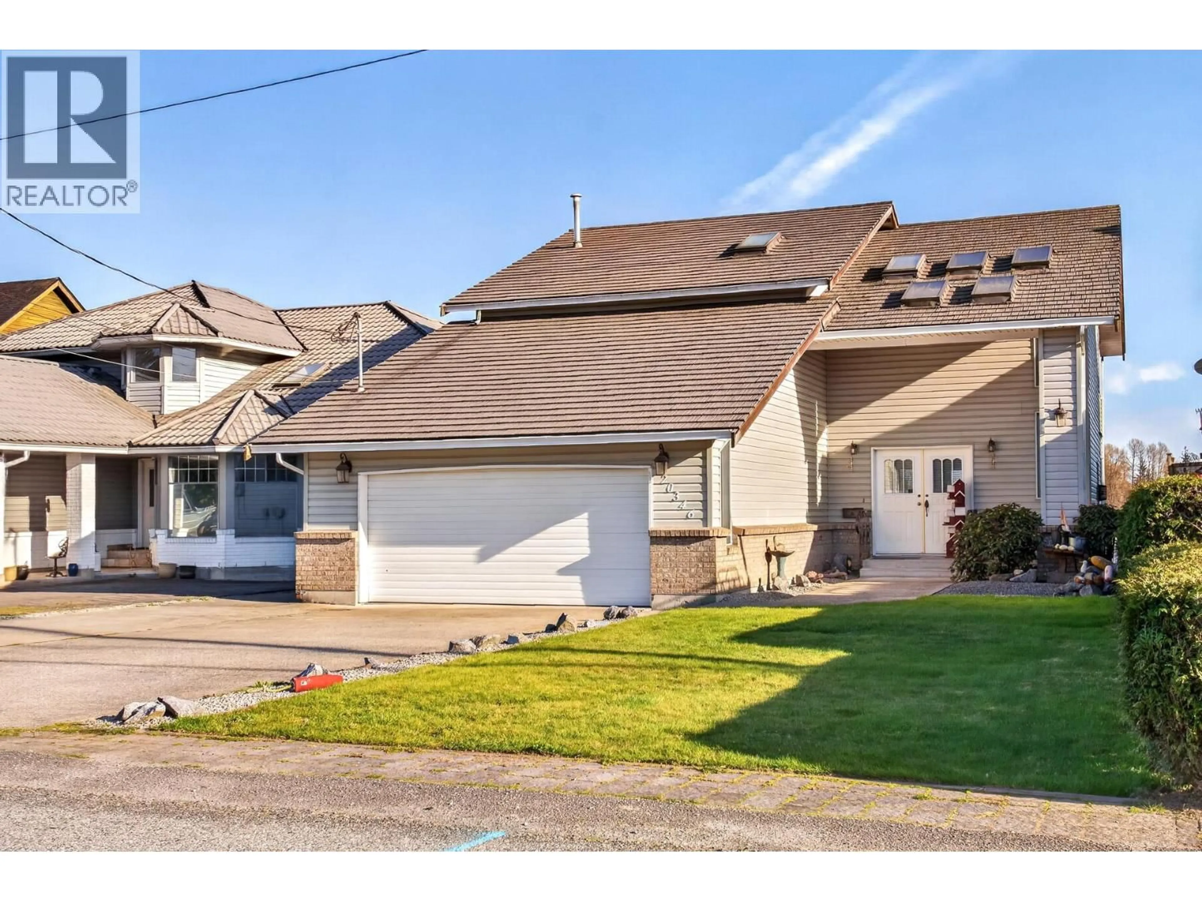 Home with vinyl exterior material, street for 20346 WHARF STREET, Maple Ridge British Columbia V2X1Z3