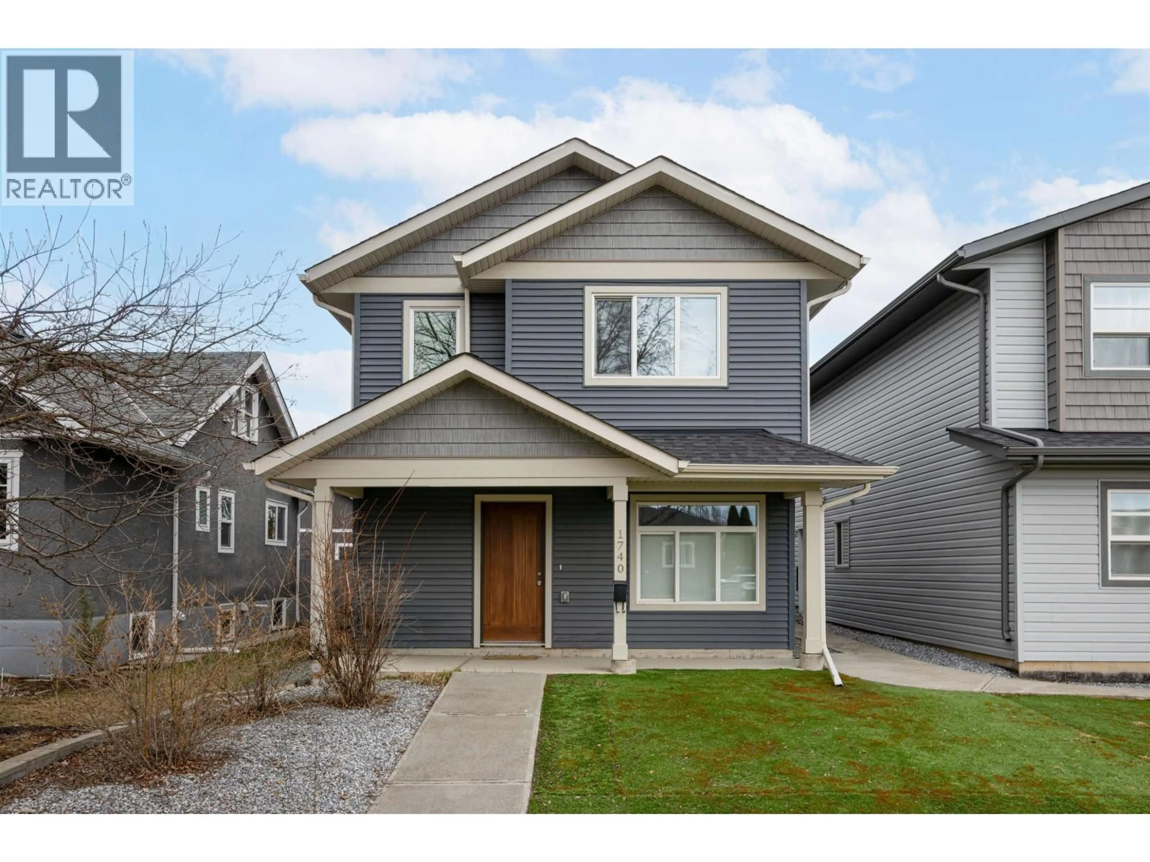 Home with vinyl exterior material, street for 1740 5TH AVENUE, Prince George British Columbia V2L3M3