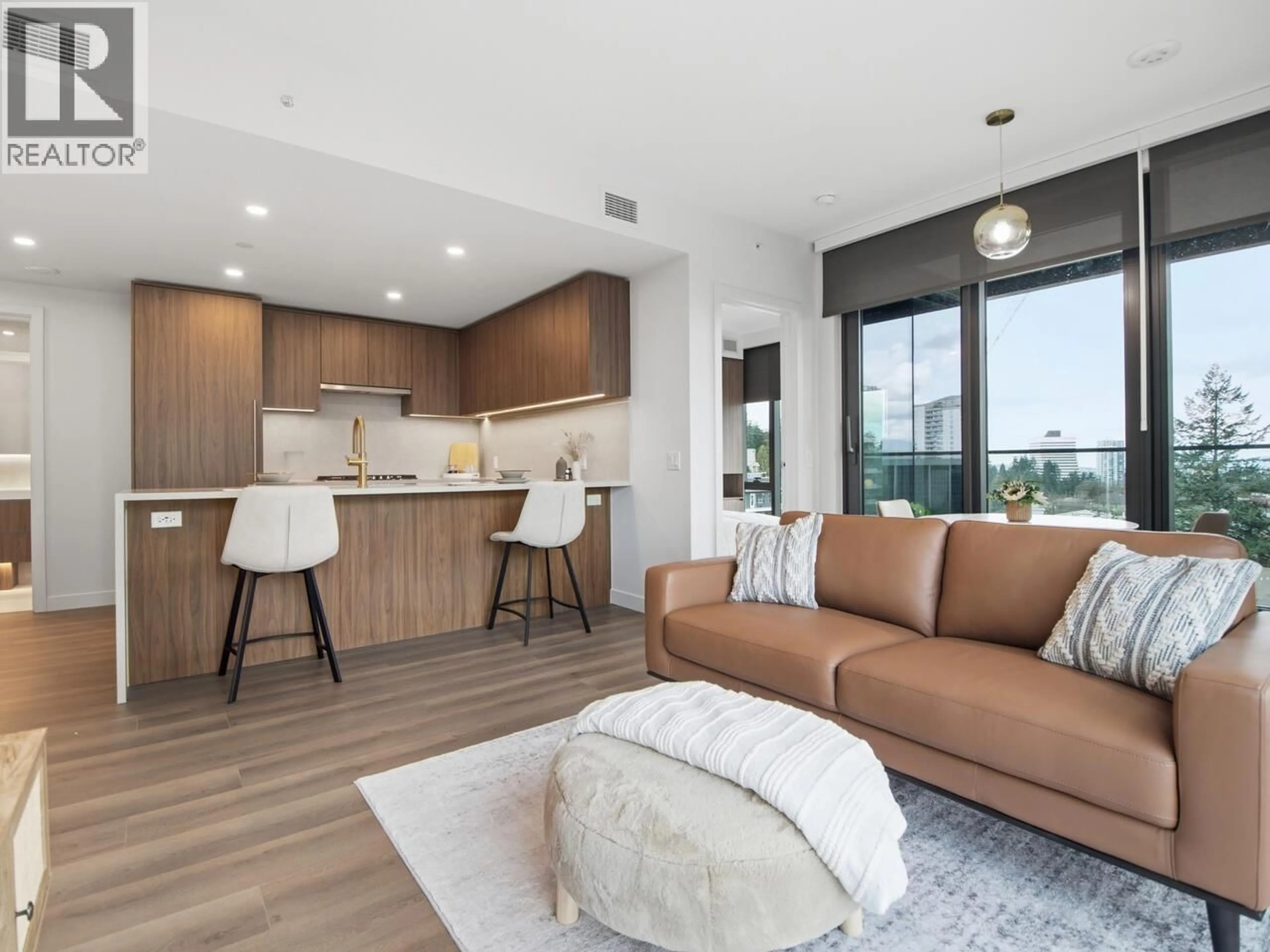 Living room with furniture, unknown for 607 - 5987 WILSON AVENUE, Burnaby British Columbia V5H0L7