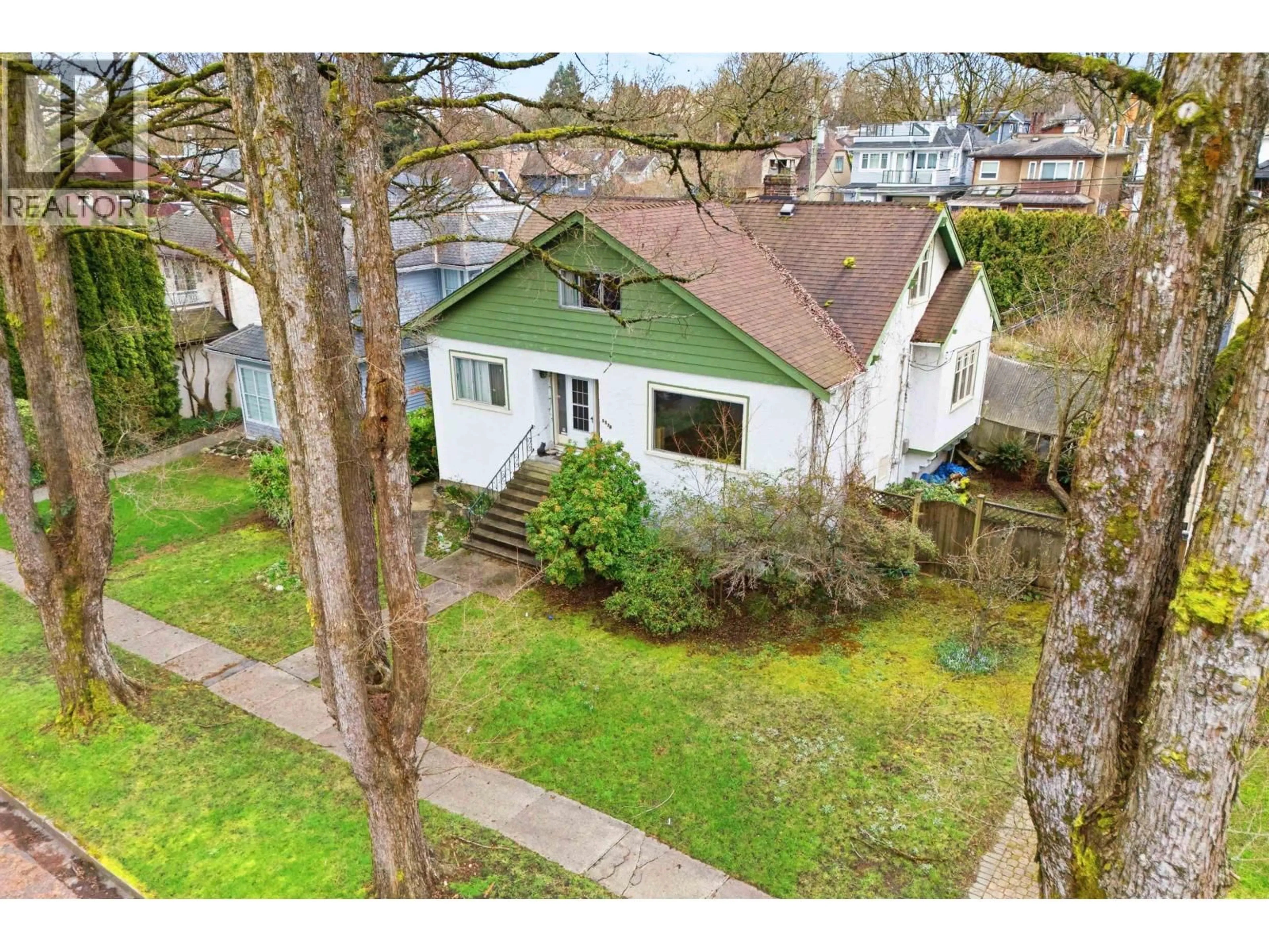 A pic from outside/outdoor area/front of a property/back of a property/a pic from drone, street for 3348 21ST AVENUE, Vancouver British Columbia V6S1G7