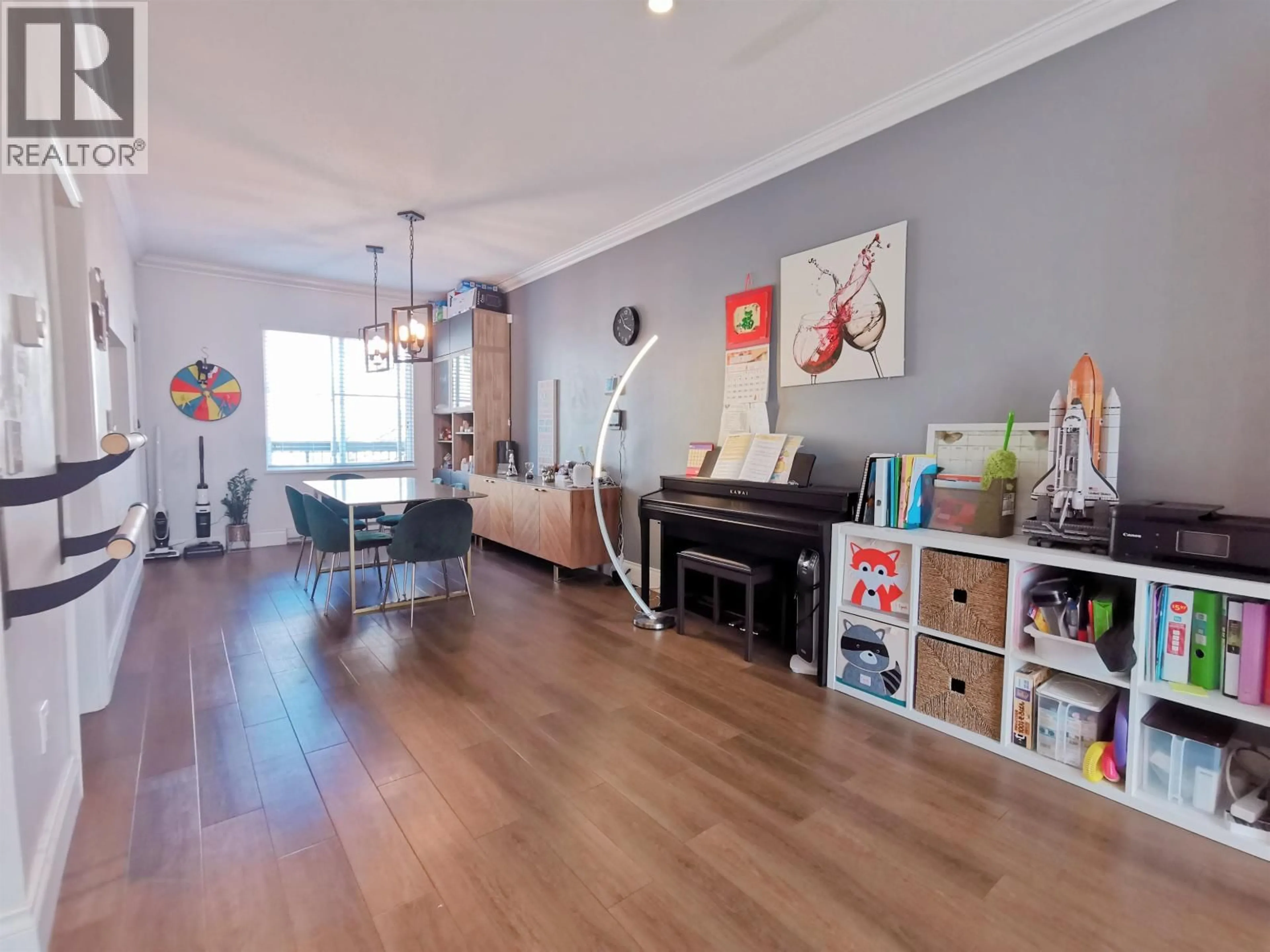 Living room with furniture, wood/laminate floor for 103 - 3880 WESTMINSTER HIGHWAY, Richmond British Columbia V7C5S1