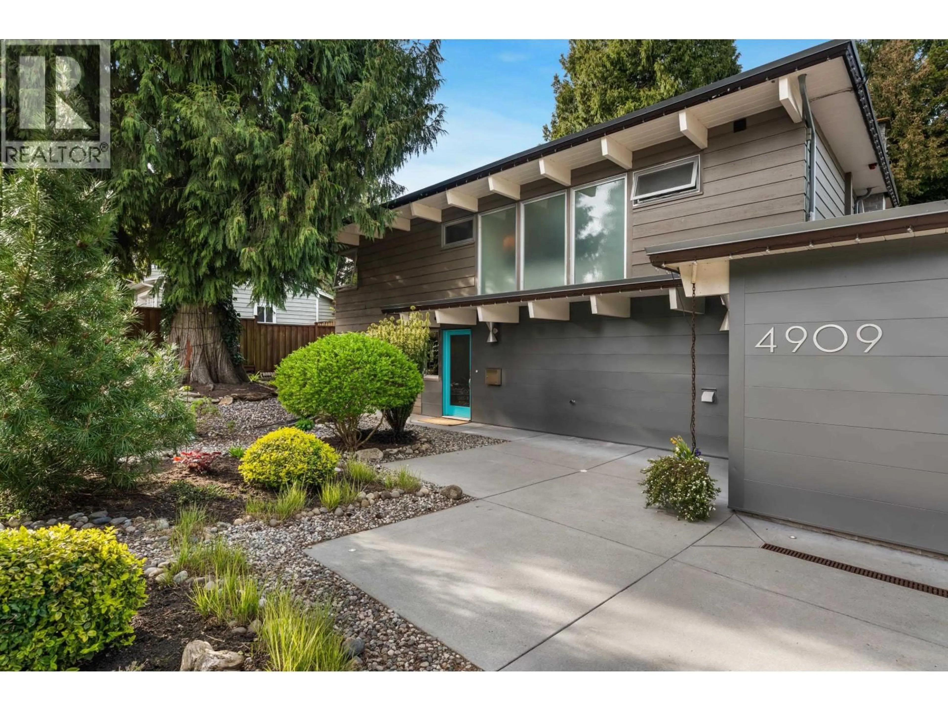 Home with brick exterior material, street for 4909 8A AVENUE, Delta British Columbia V4M1S8