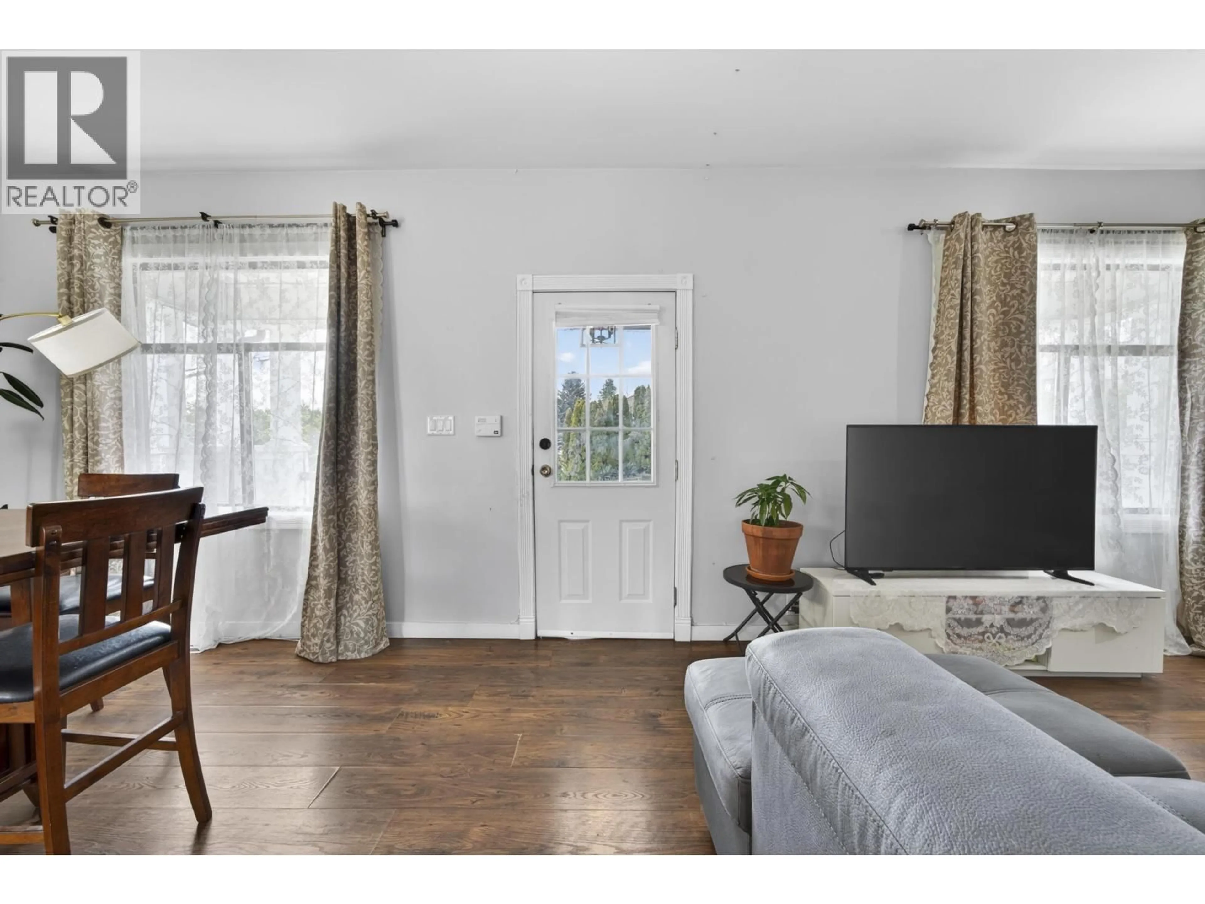 Living room with furniture, wood/laminate floor for 319 MARMONT STREET, Coquitlam British Columbia V3K4R4
