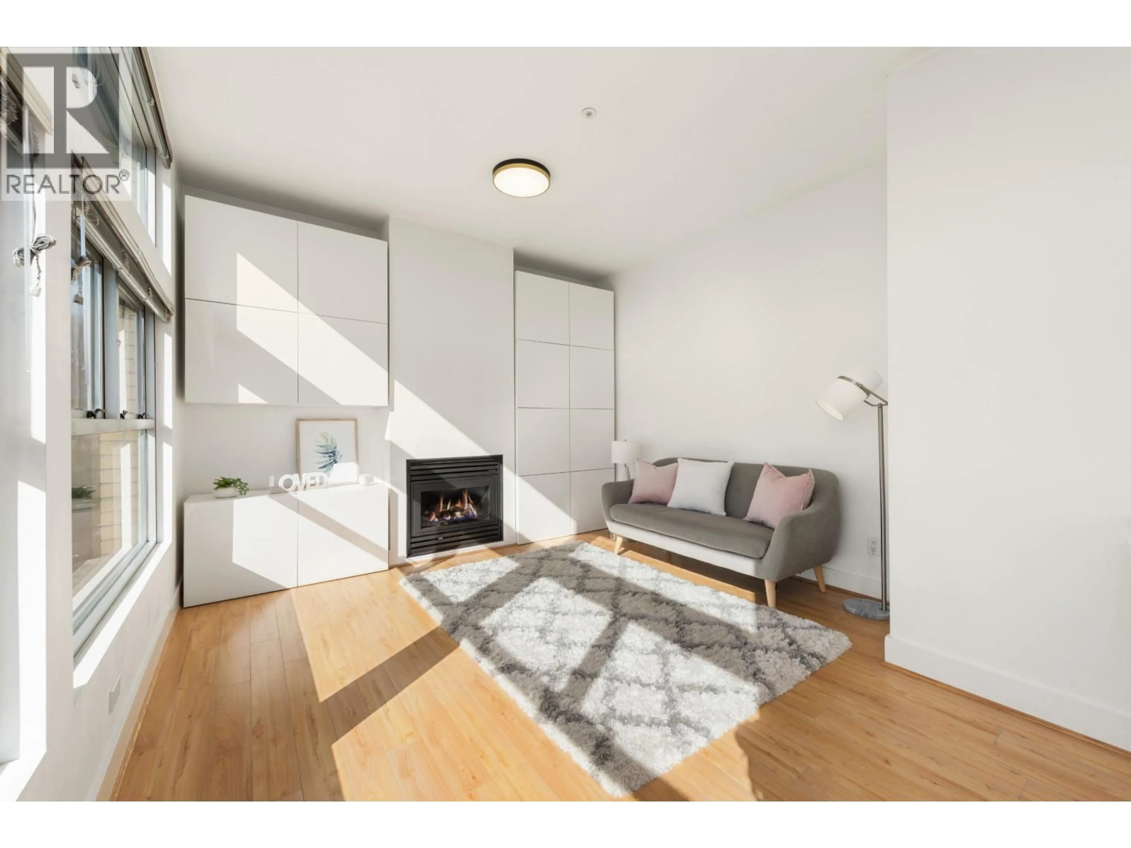 Living room with furniture, wood/laminate floor for PH2 - 2088 11TH AVENUE, Vancouver British Columbia V6J2C9