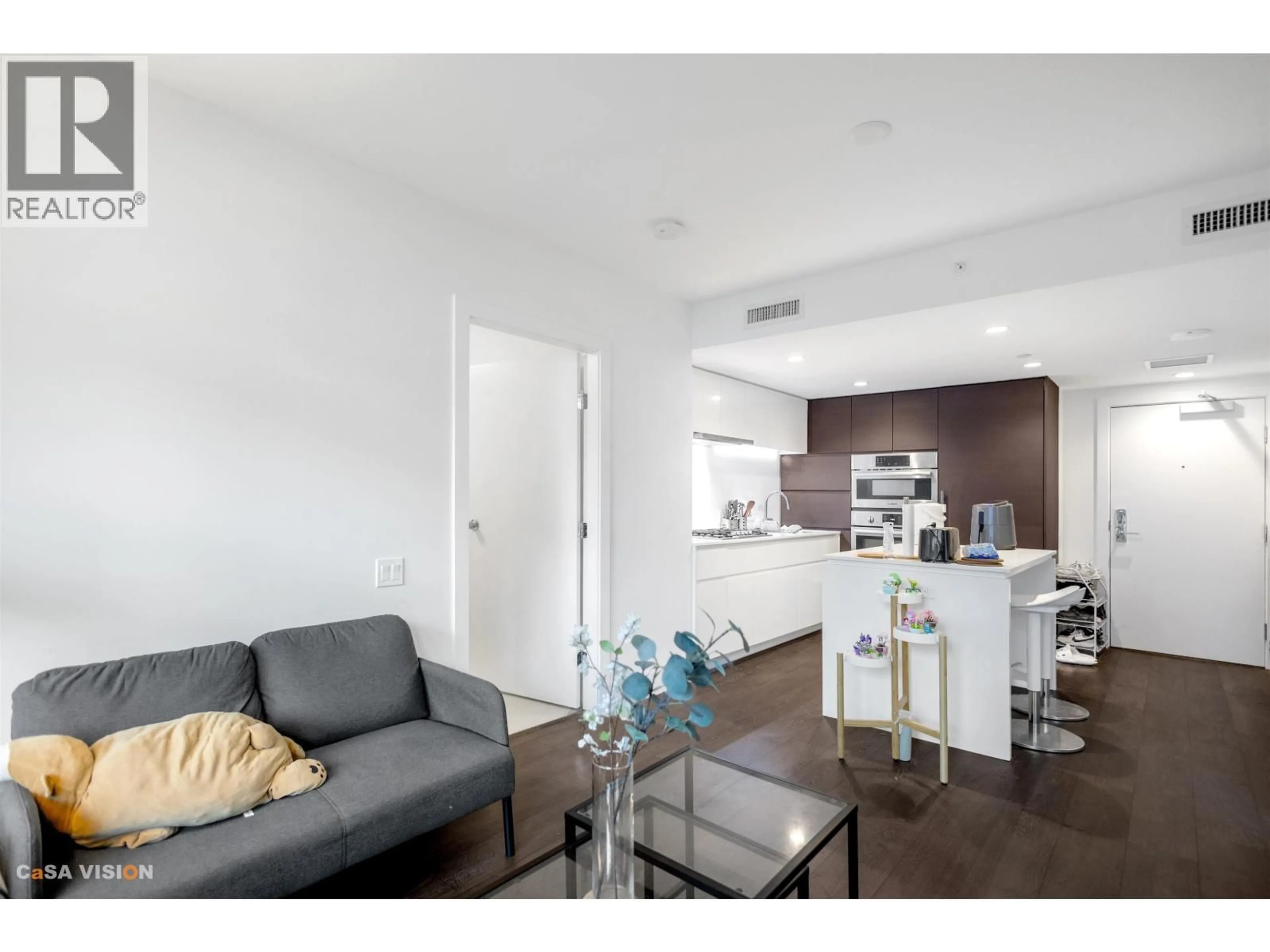 Living room with furniture, wood/laminate floor for 417 - 5508 HOLLYBRIDGE WAY, Richmond British Columbia V7C0C7