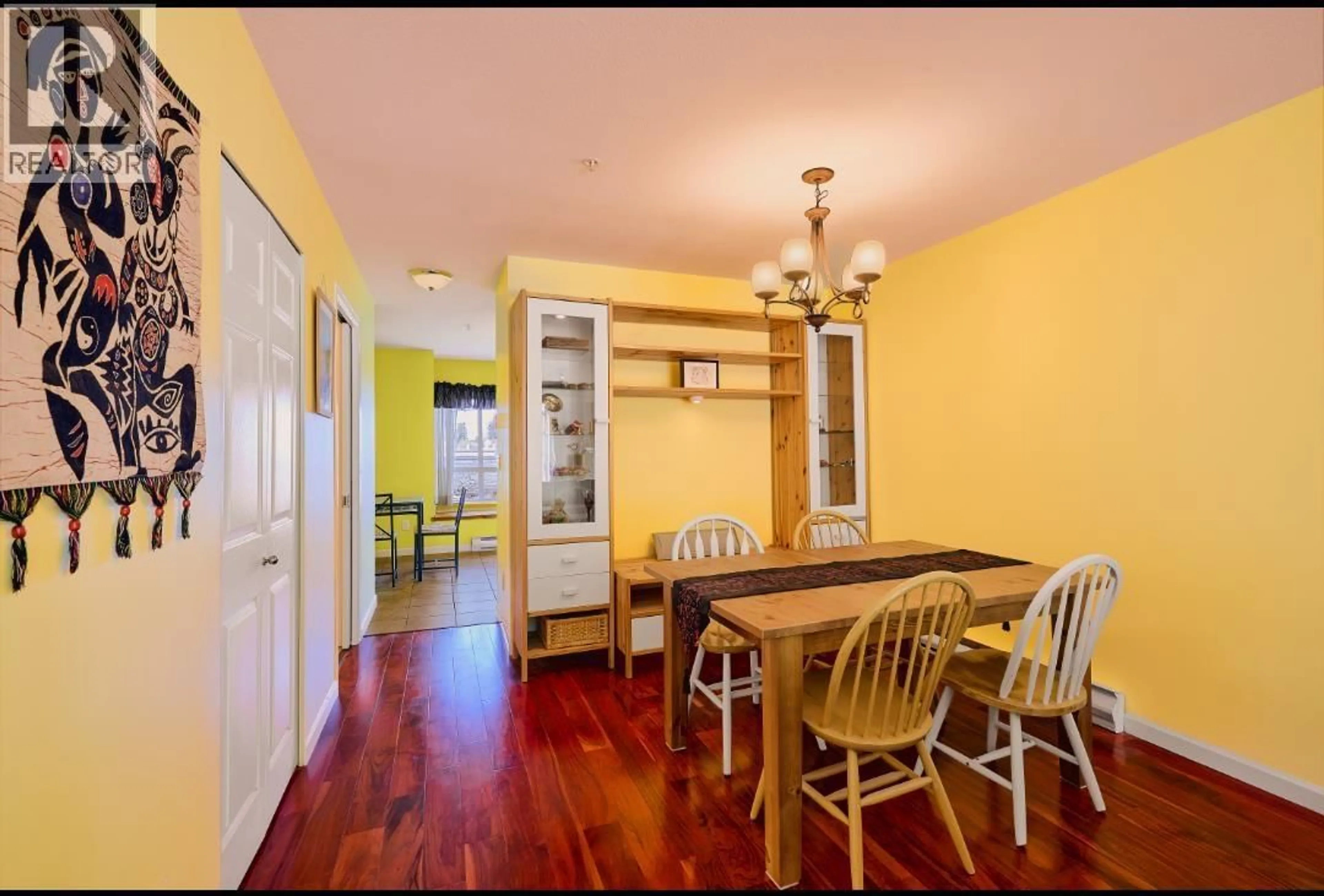Dining room, wood/laminate floor for 117 - 6588 SOUTHOAKS CRESCENT, Burnaby British Columbia V5E4K1