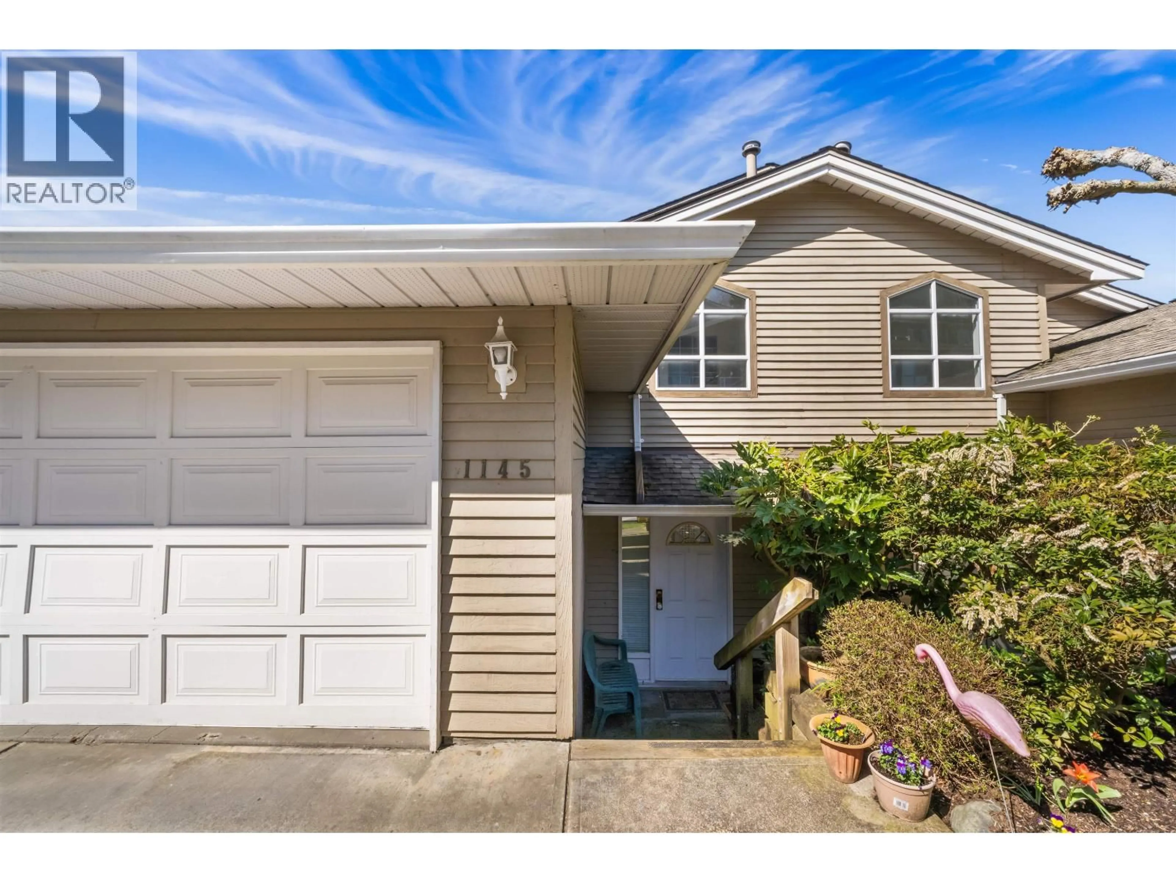 Home with vinyl exterior material, street for 1145 O'FLAHERTY GATE, Port Coquitlam British Columbia V3C6H2