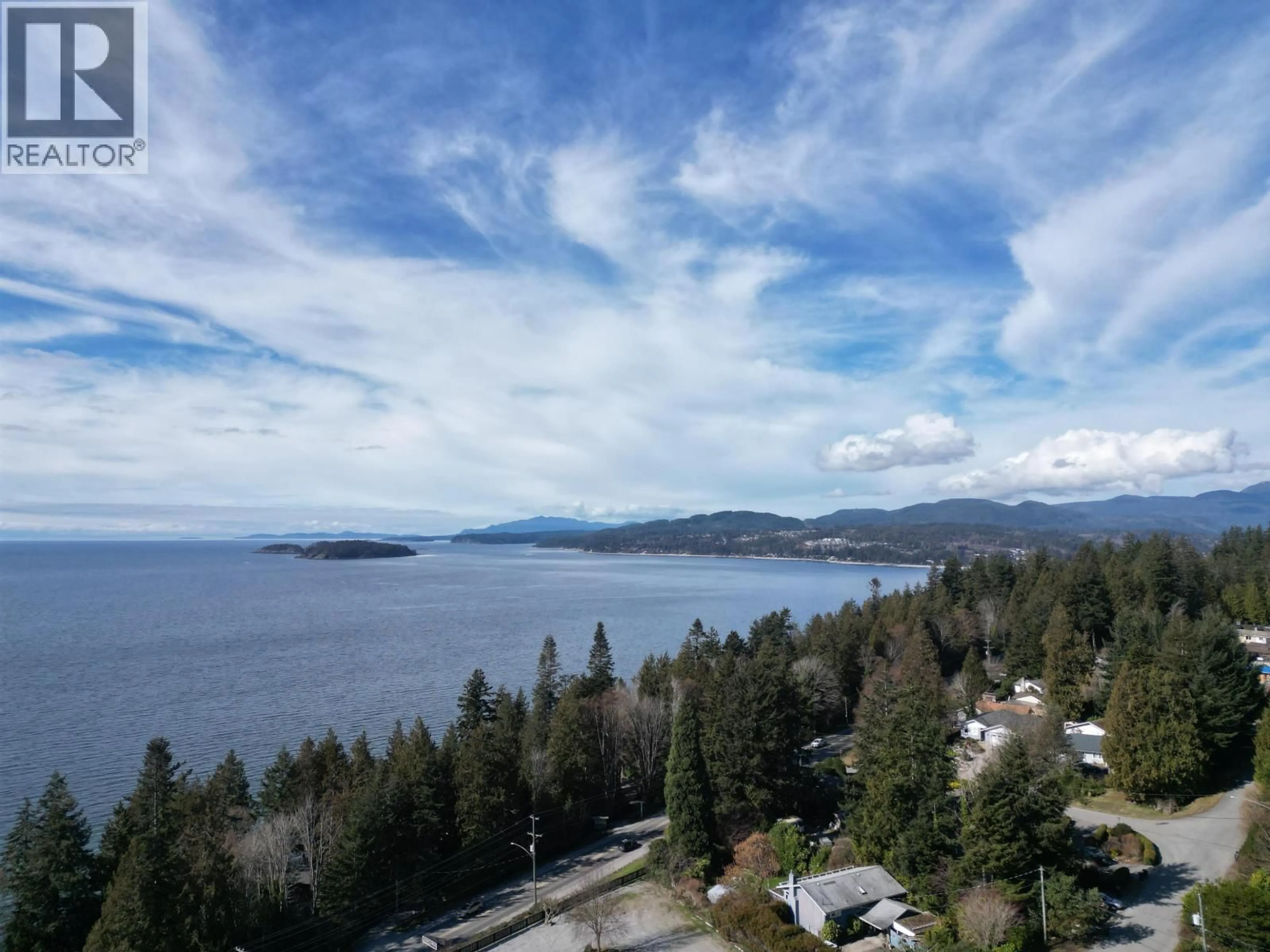 A pic from outside/outdoor area/front of a property/back of a property/a pic from drone, water/lake/river/ocean view for 4934 GEER ROAD, Sechelt British Columbia V0N3A2