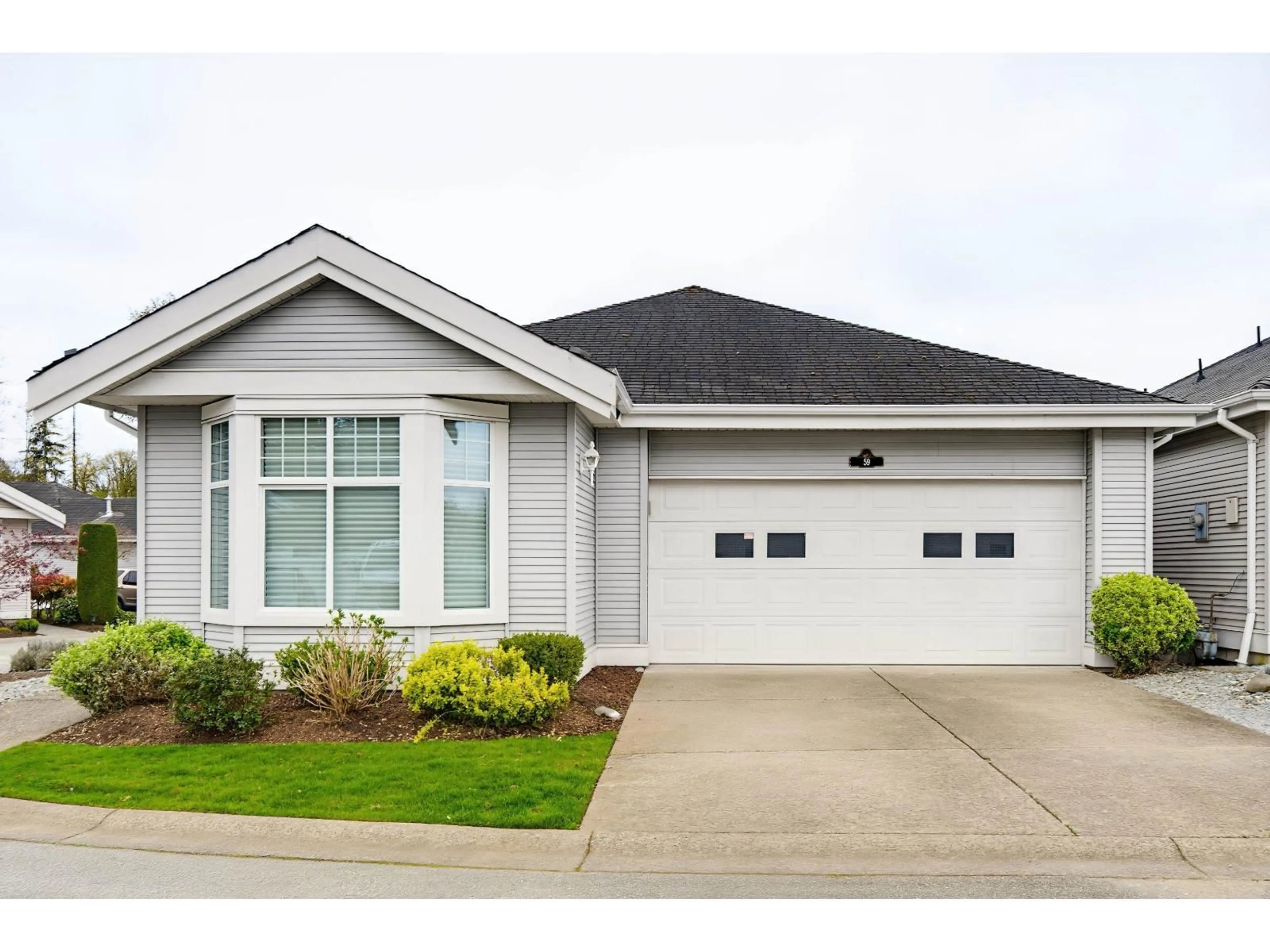 Home with vinyl exterior material, street for 59 - 20770 97B AVENUE, Langley British Columbia V1M3X9