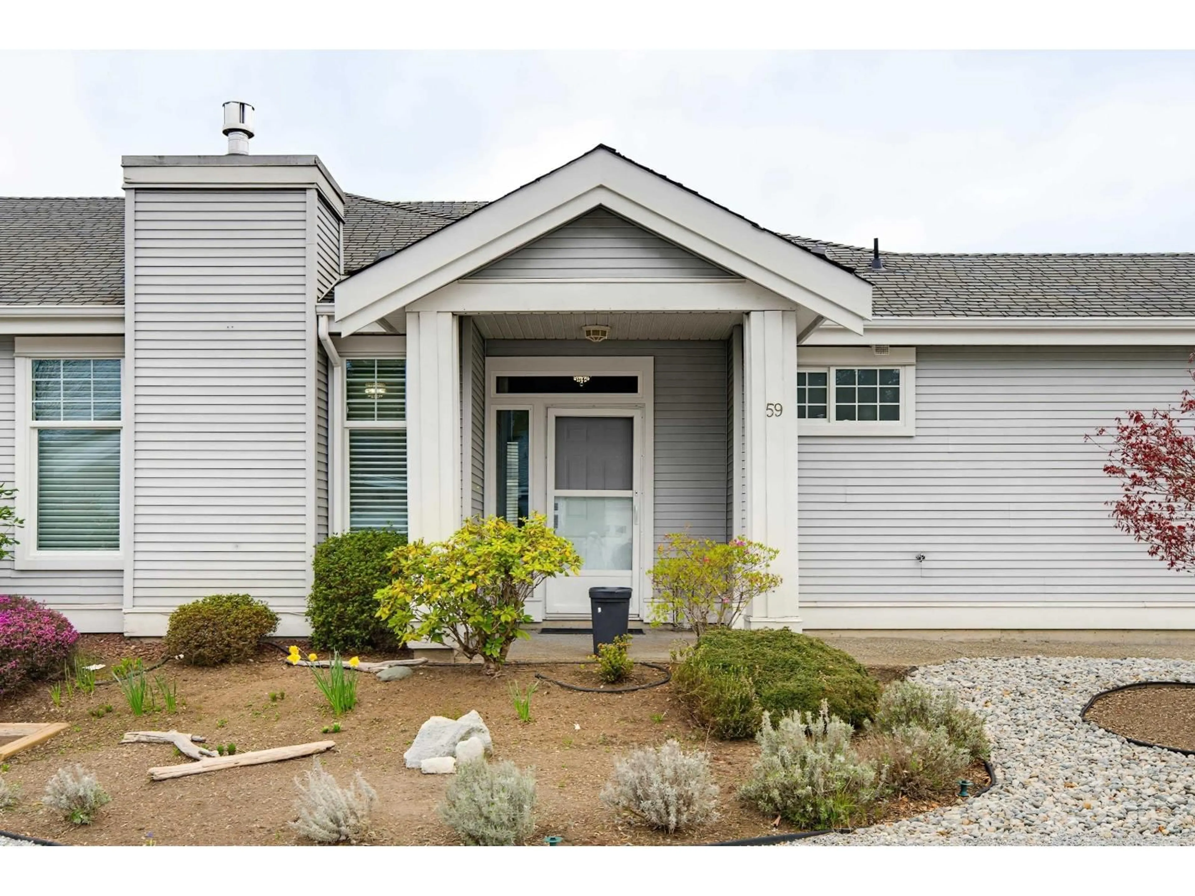 Home with vinyl exterior material, street for 59 - 20770 97B AVENUE, Langley British Columbia V1M3X9