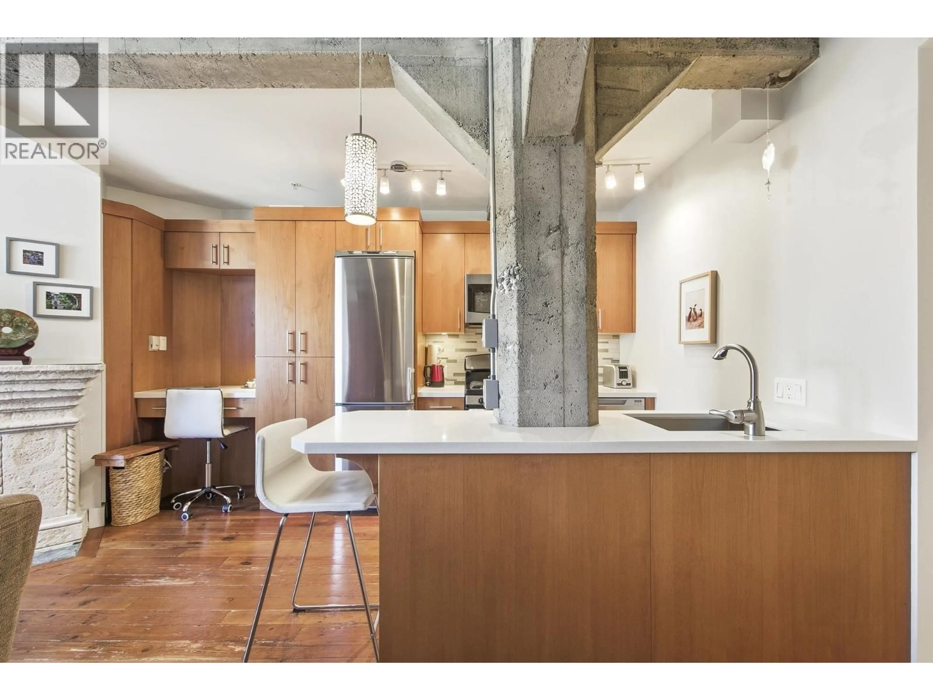 Open concept kitchen, cement floor for 512 - 1216 HOMER STREET, Vancouver British Columbia V6B6K5