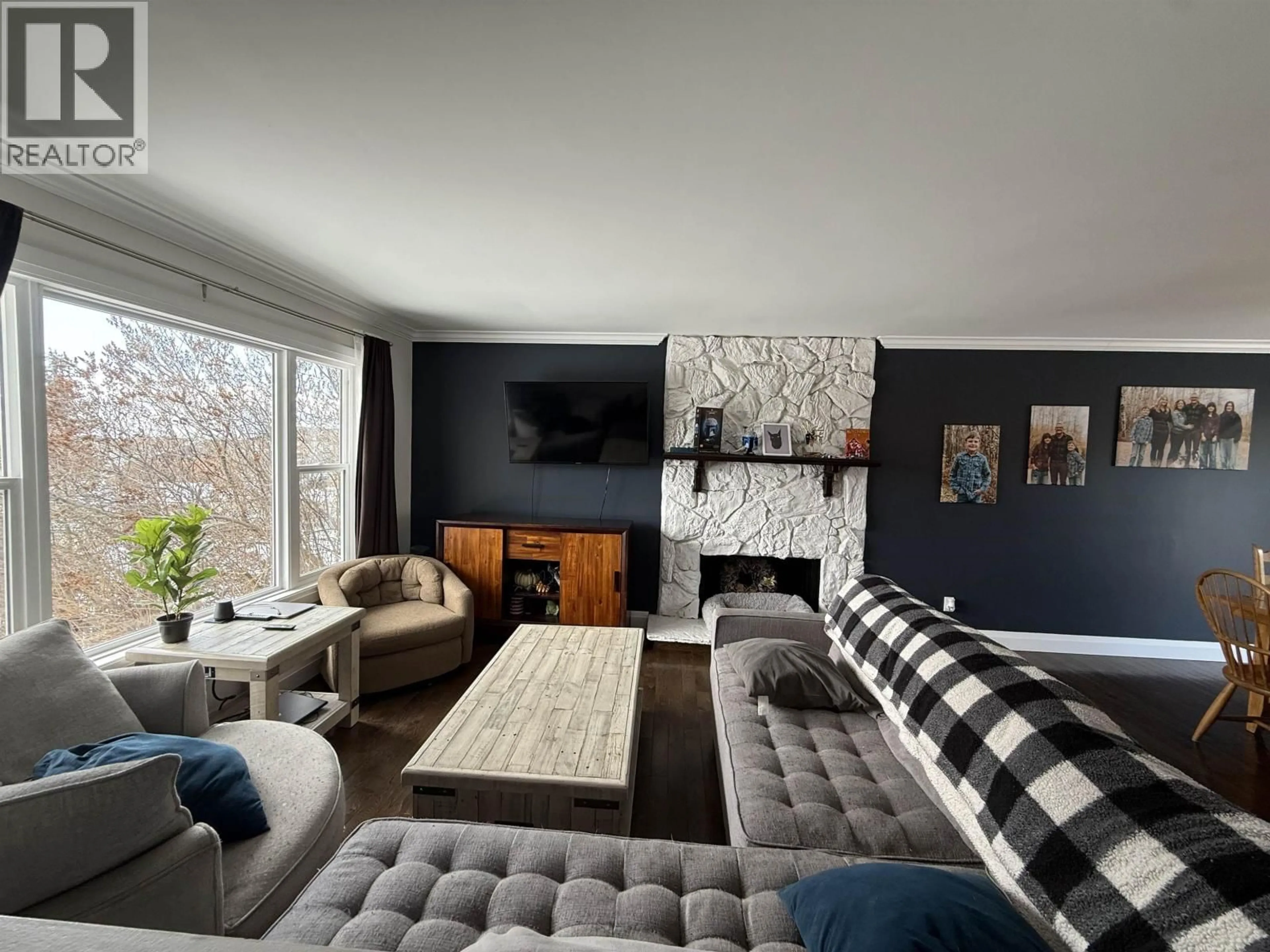 Living room with furniture, unknown for 9124 98A AVENUE, Fort St. John British Columbia V1J5E4