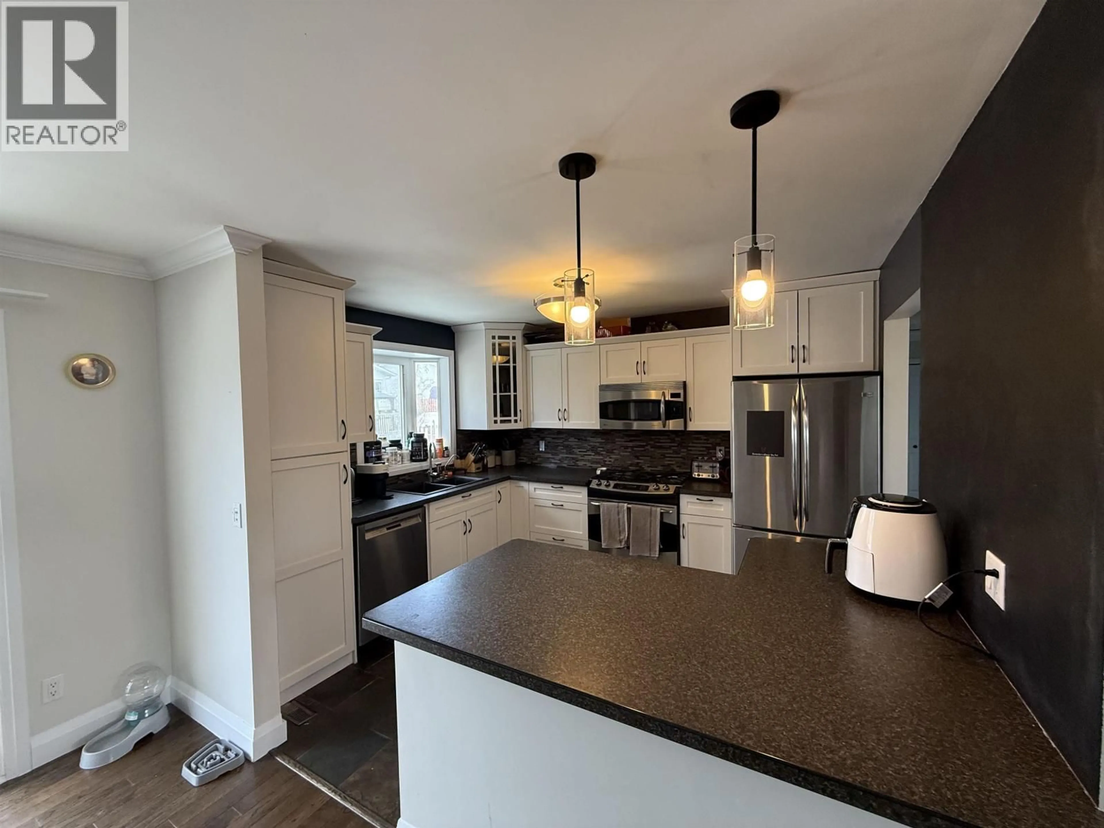 Open concept kitchen, unknown for 9124 98A AVENUE, Fort St. John British Columbia V1J5E4
