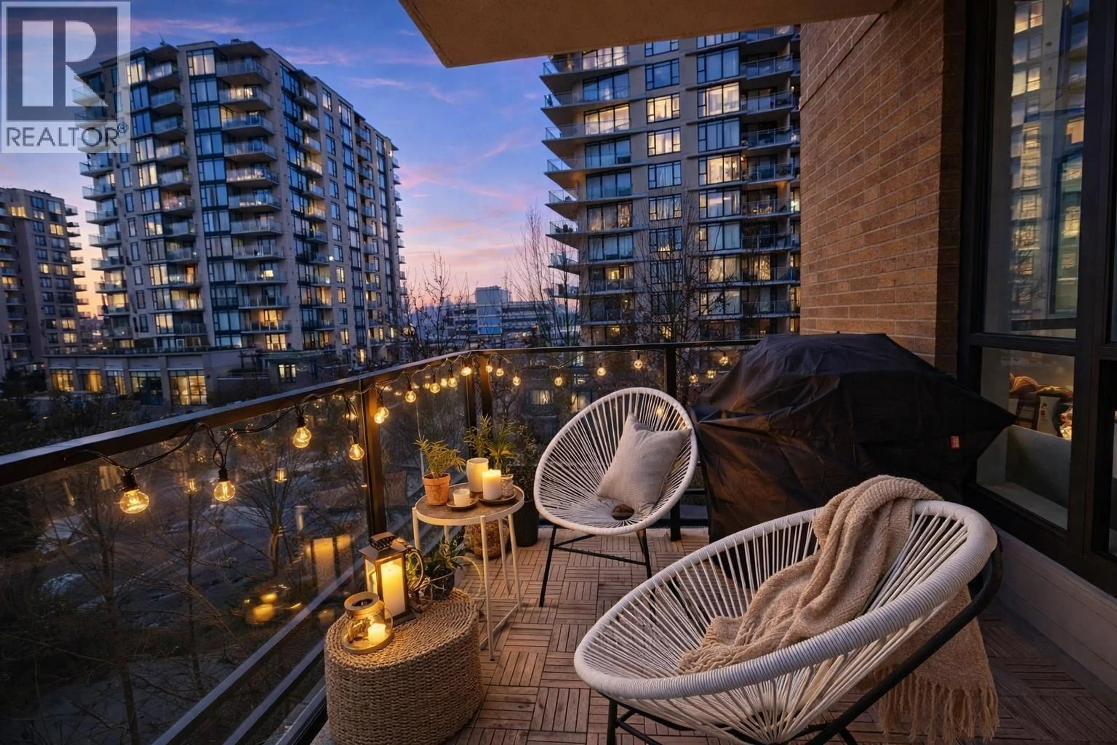 Patio, city buildings view from balcony for 403 - 170 1ST STREET, North Vancouver British Columbia V7M3P2