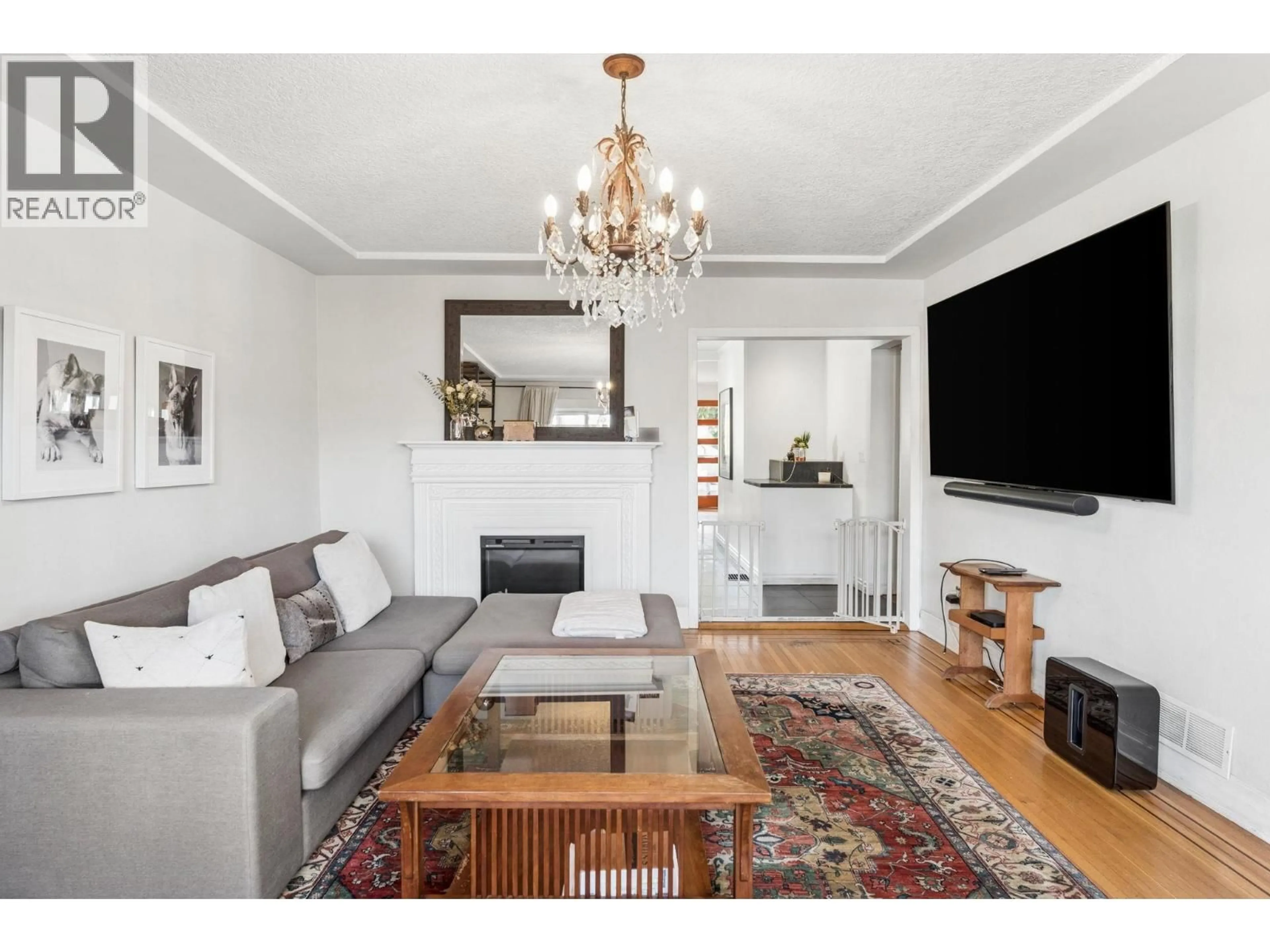 Living room with furniture, wood/laminate floor for 2486 ETON STREET, Vancouver British Columbia V5K1J5