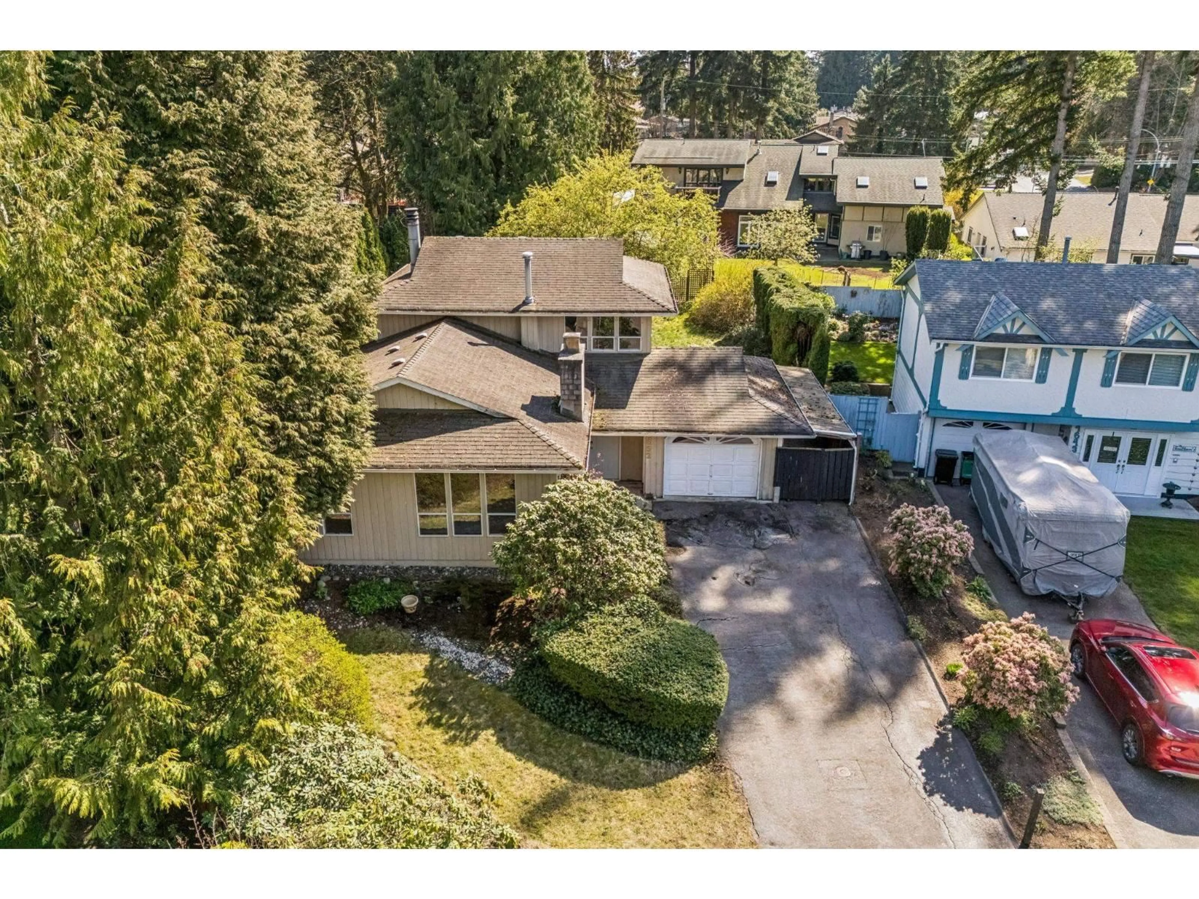 A pic from outside/outdoor area/front of a property/back of a property/a pic from drone, street for 4652 197 STREET, Langley British Columbia V3A5H4