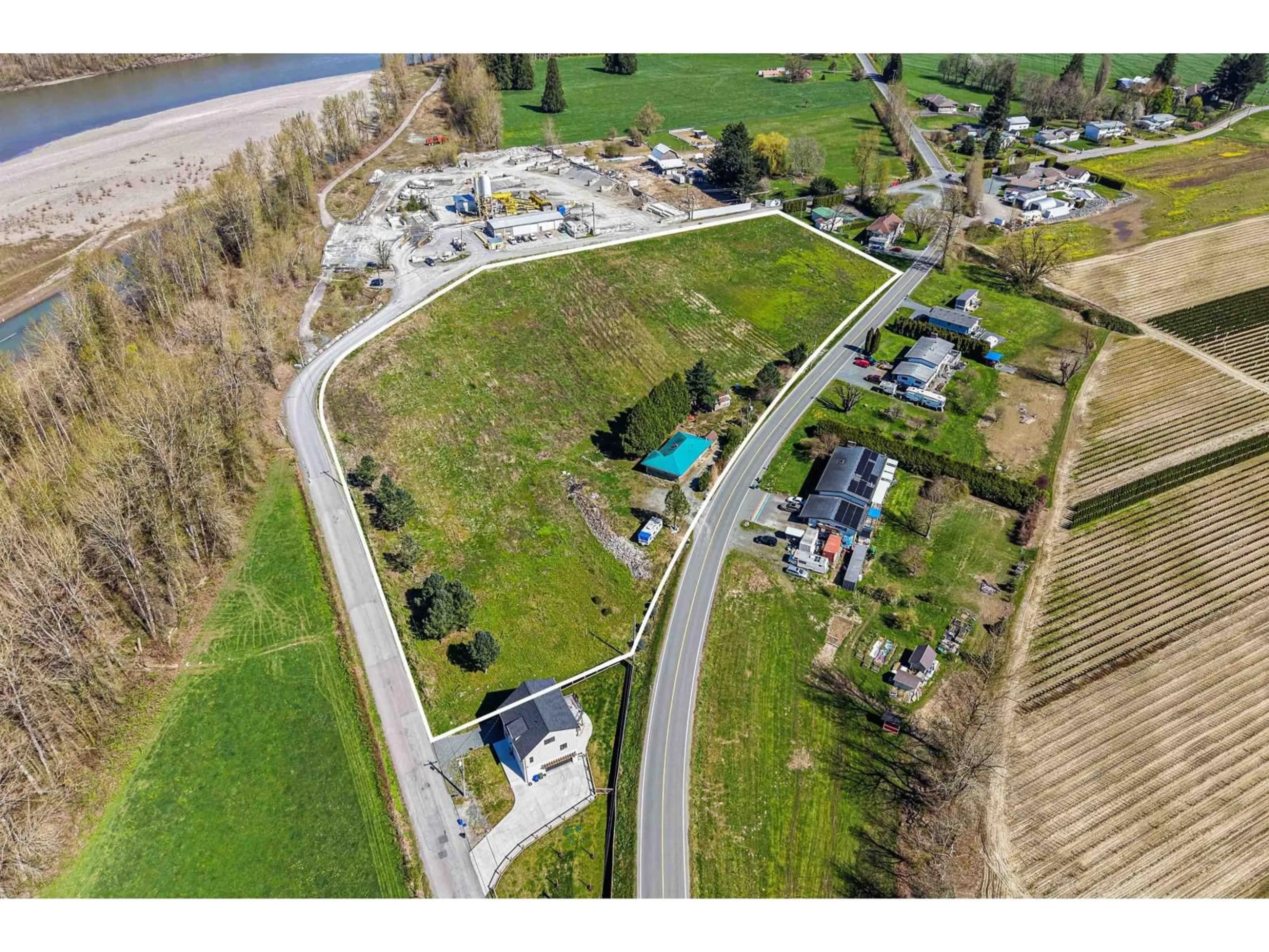 A pic from outside/outdoor area/front of a property/back of a property/a pic from drone, water/lake/river/ocean view for 10715 TOWER ROAD, Chilliwack British Columbia V2P8B9