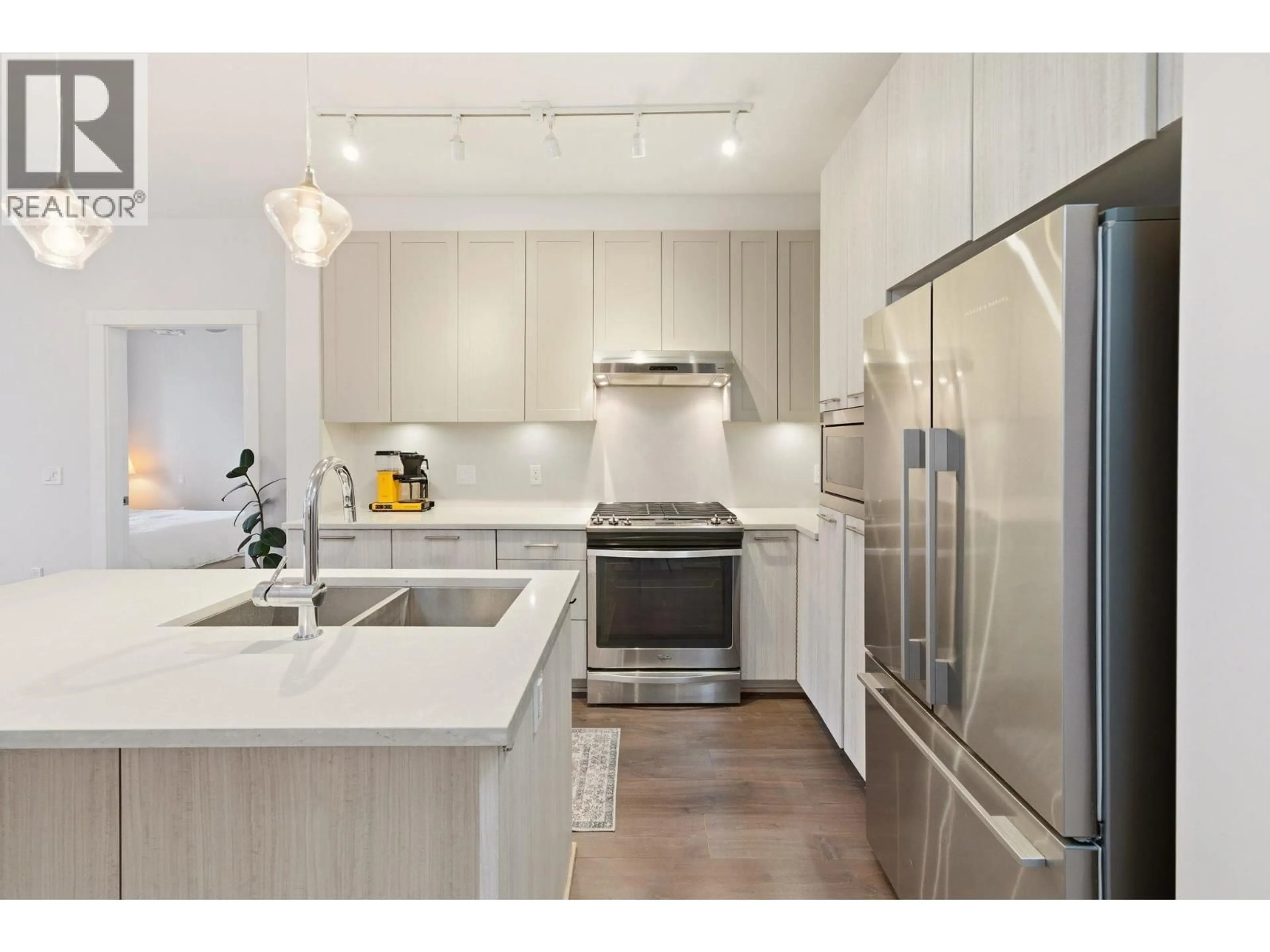 Open concept kitchen, unknown for 304 - 123 1ST STREET, North Vancouver British Columbia V7M0E5