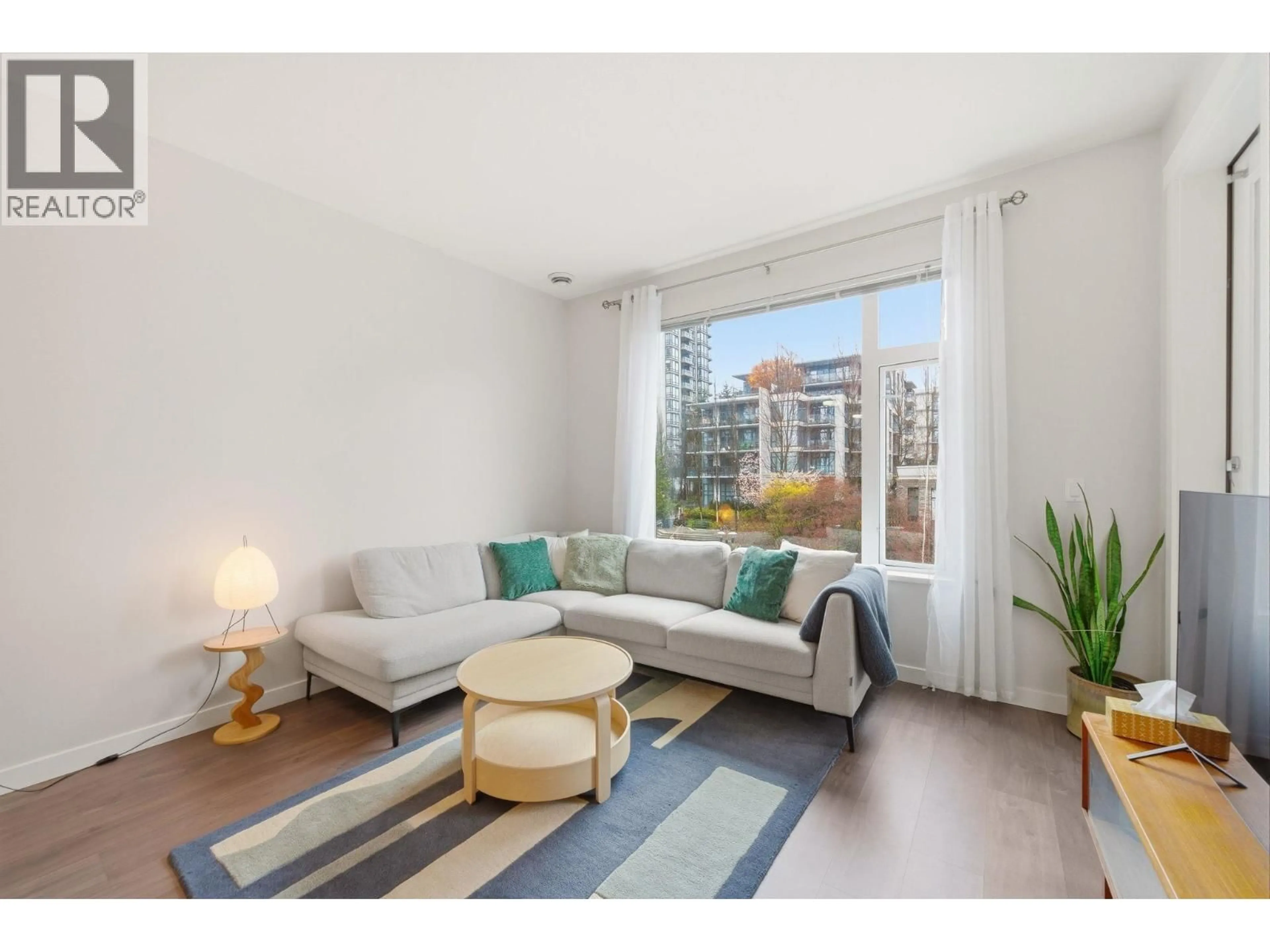 Living room with furniture, unknown for 304 - 123 1ST STREET, North Vancouver British Columbia V7M0E5