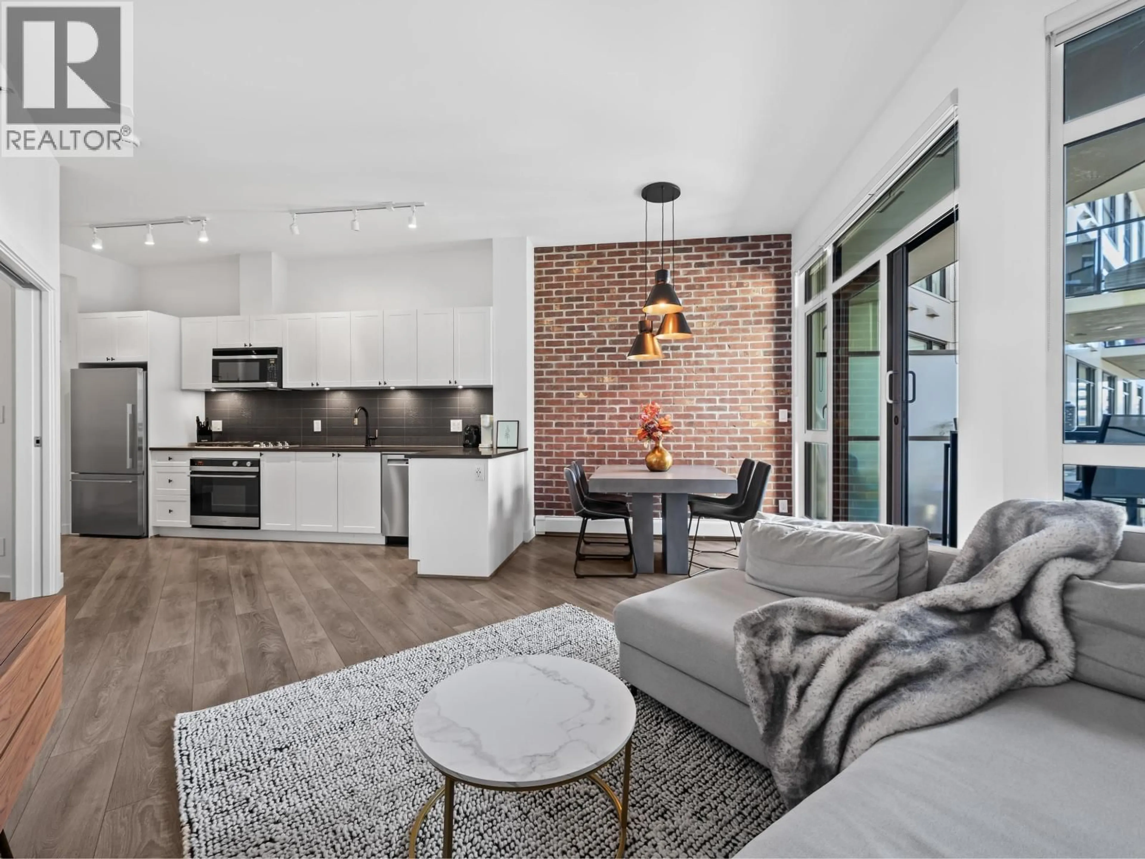 Open concept kitchen, unknown for 305 - 105 2ND STREET, North Vancouver British Columbia V7M0E3