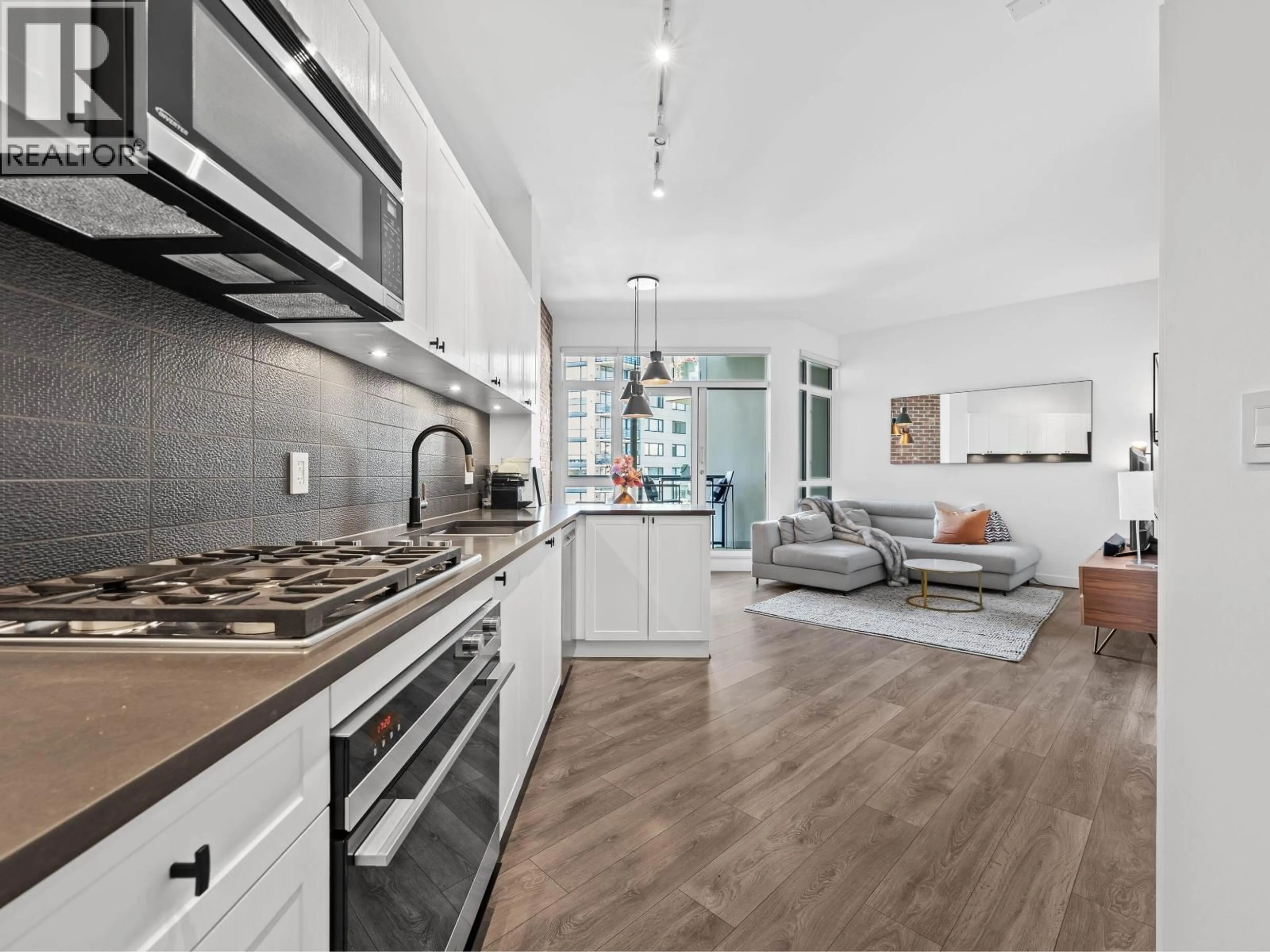 Open concept kitchen, unknown for 305 - 105 2ND STREET, North Vancouver British Columbia V7M0E3