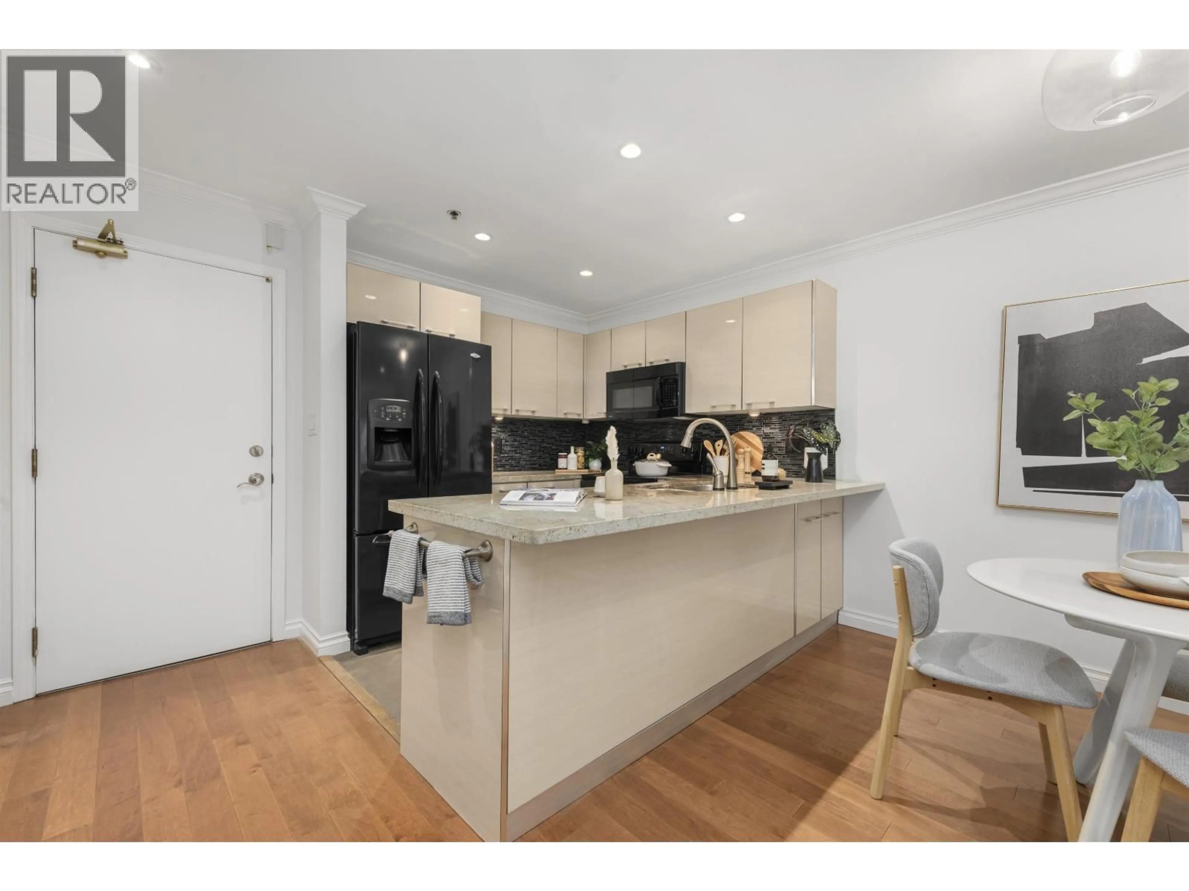 Open concept kitchen, unknown for 103 - 1925 2ND AVENUE, Vancouver British Columbia V6J1J2