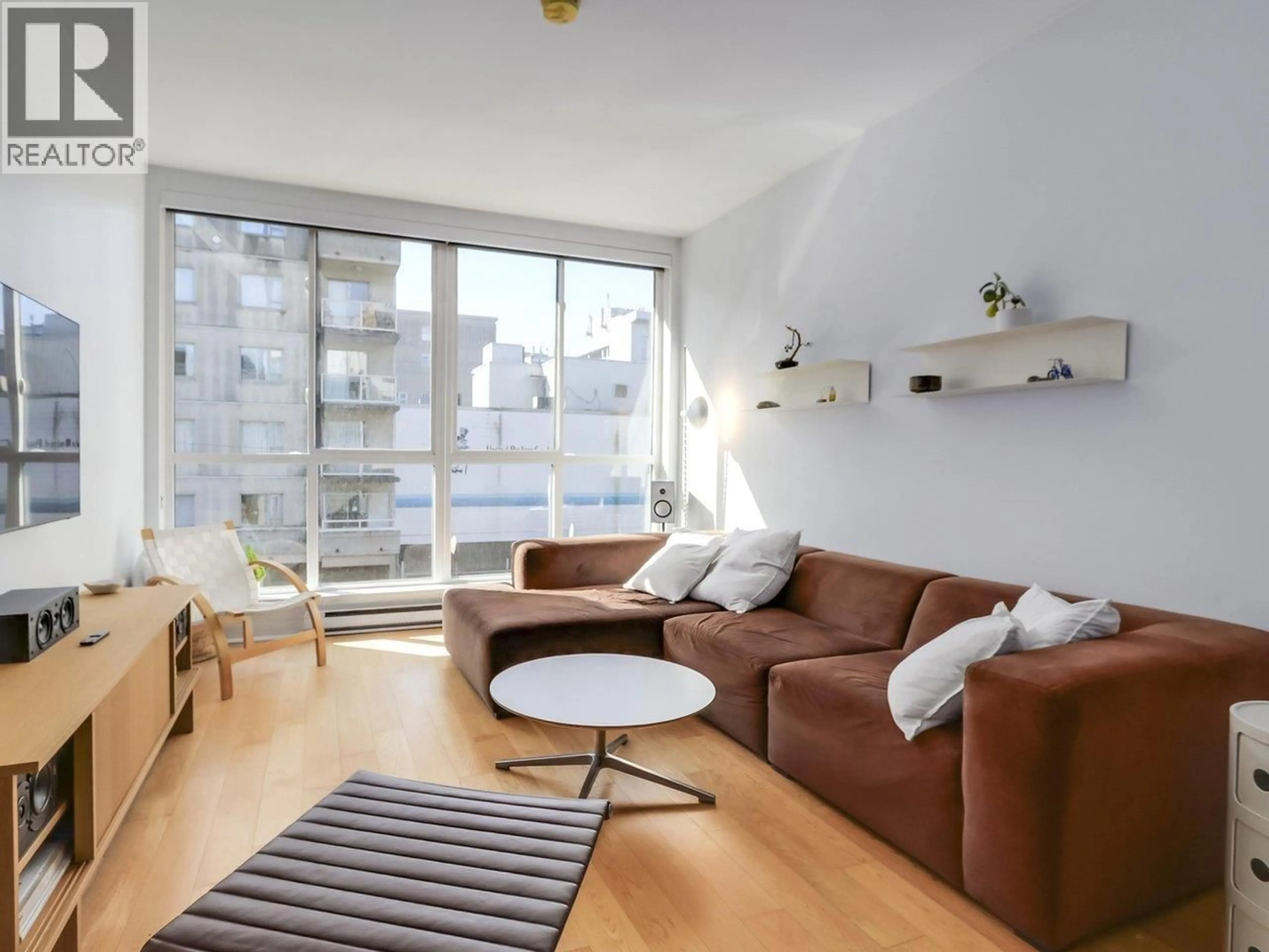 Living room with furniture, unknown for 312 - 557 CORDOVA STREET, Vancouver British Columbia V6A1L8