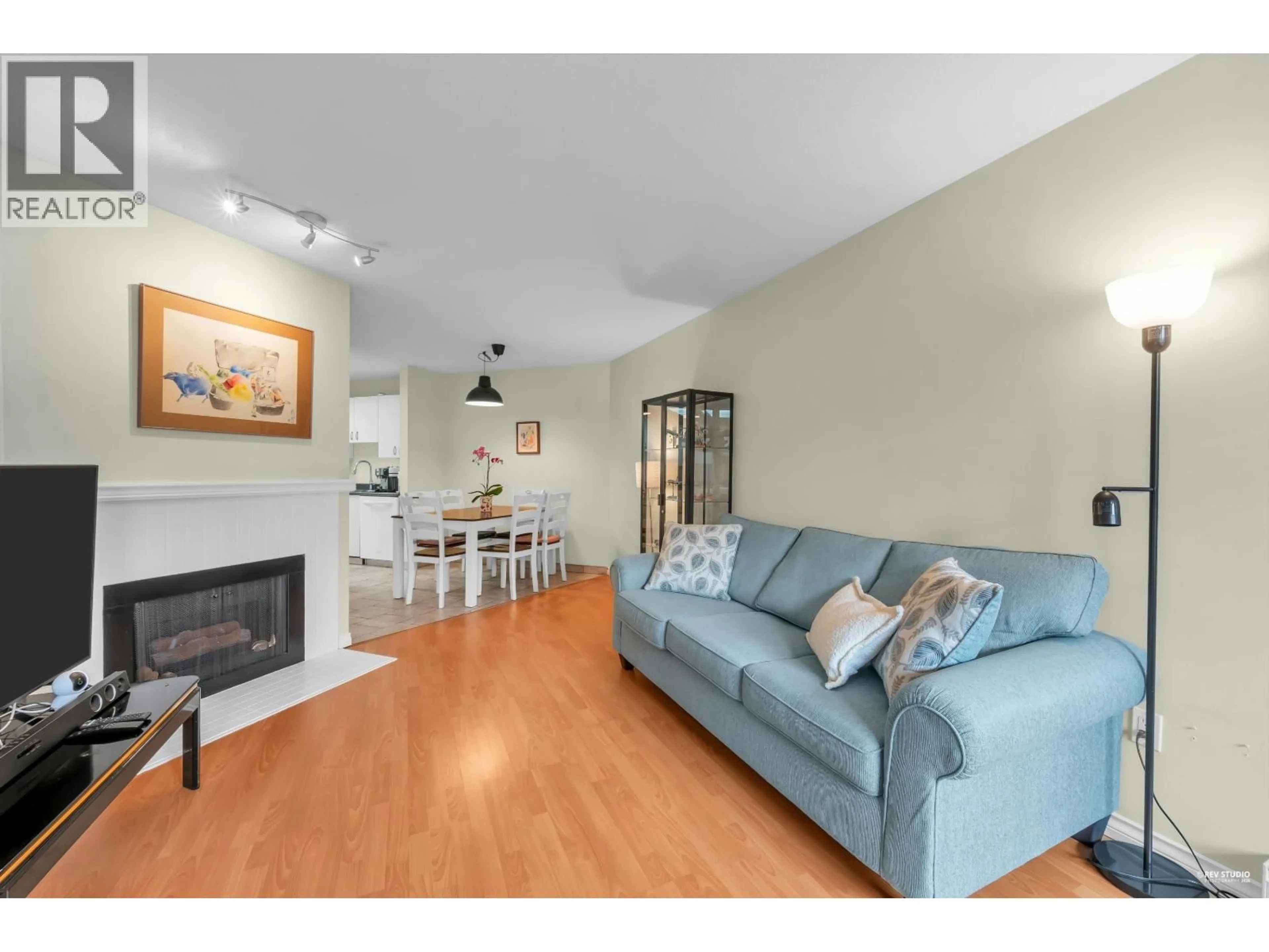 Living room with furniture, wood/laminate floor for 101 - 7840 MOFFATT ROAD, Richmond British Columbia V6Y1X8