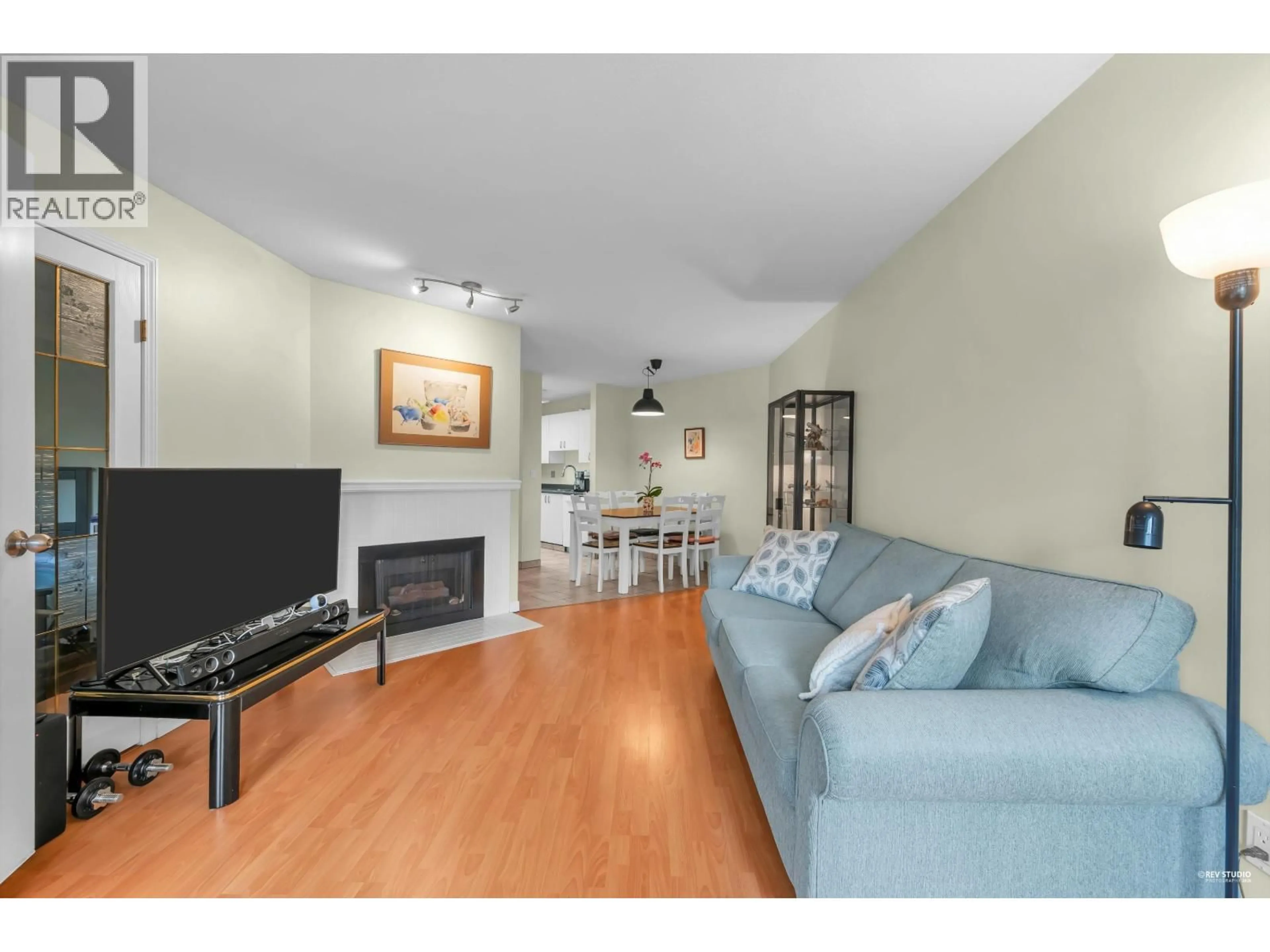 Living room with furniture, wood/laminate floor for 101 - 7840 MOFFATT ROAD, Richmond British Columbia V6Y1X8