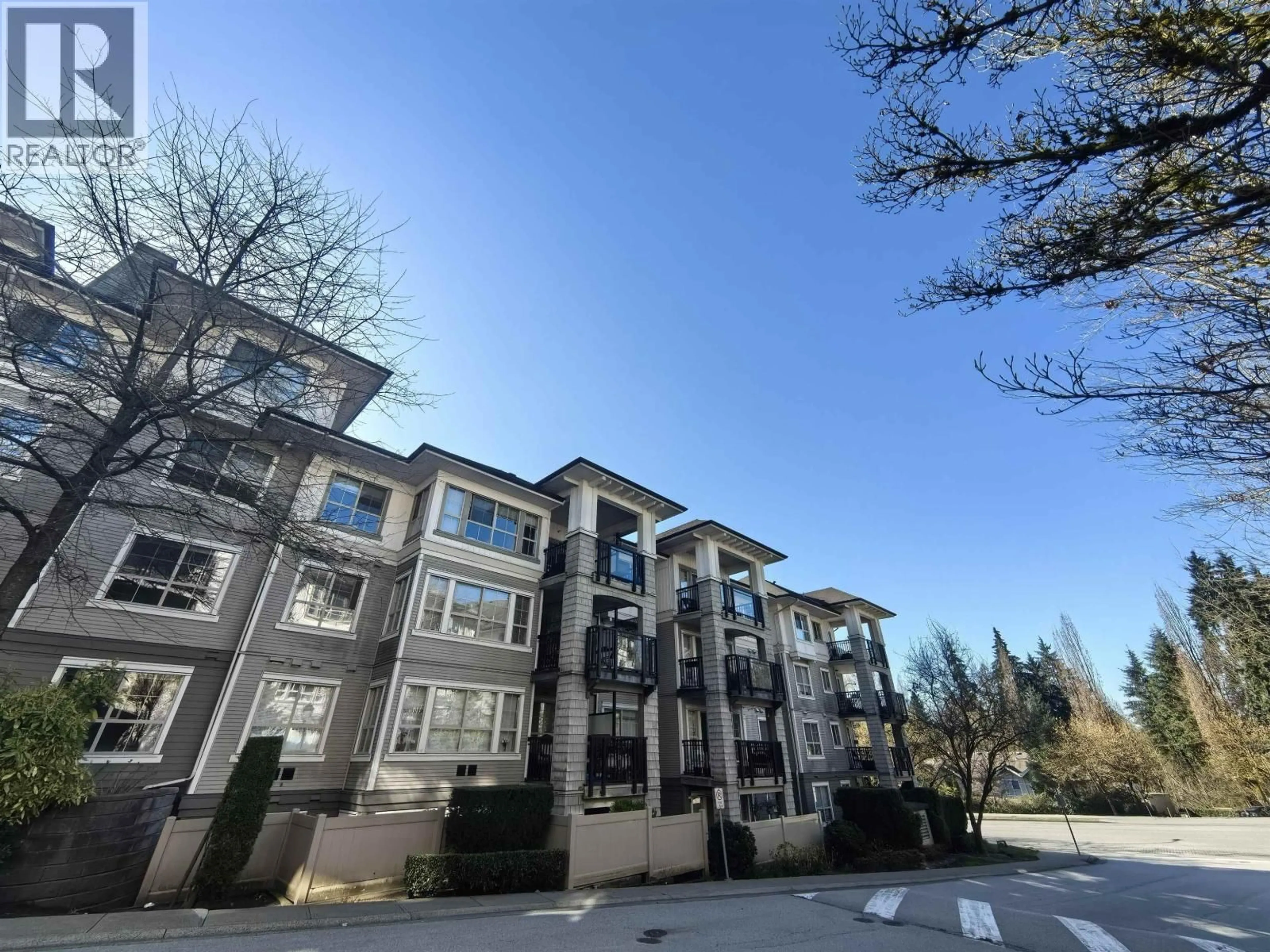 A pic from outside/outdoor area/front of a property/back of a property/a pic from drone, unknown for 203 - 2951 SILVER SPRINGS BOULEVARD, Coquitlam British Columbia V3E3S4