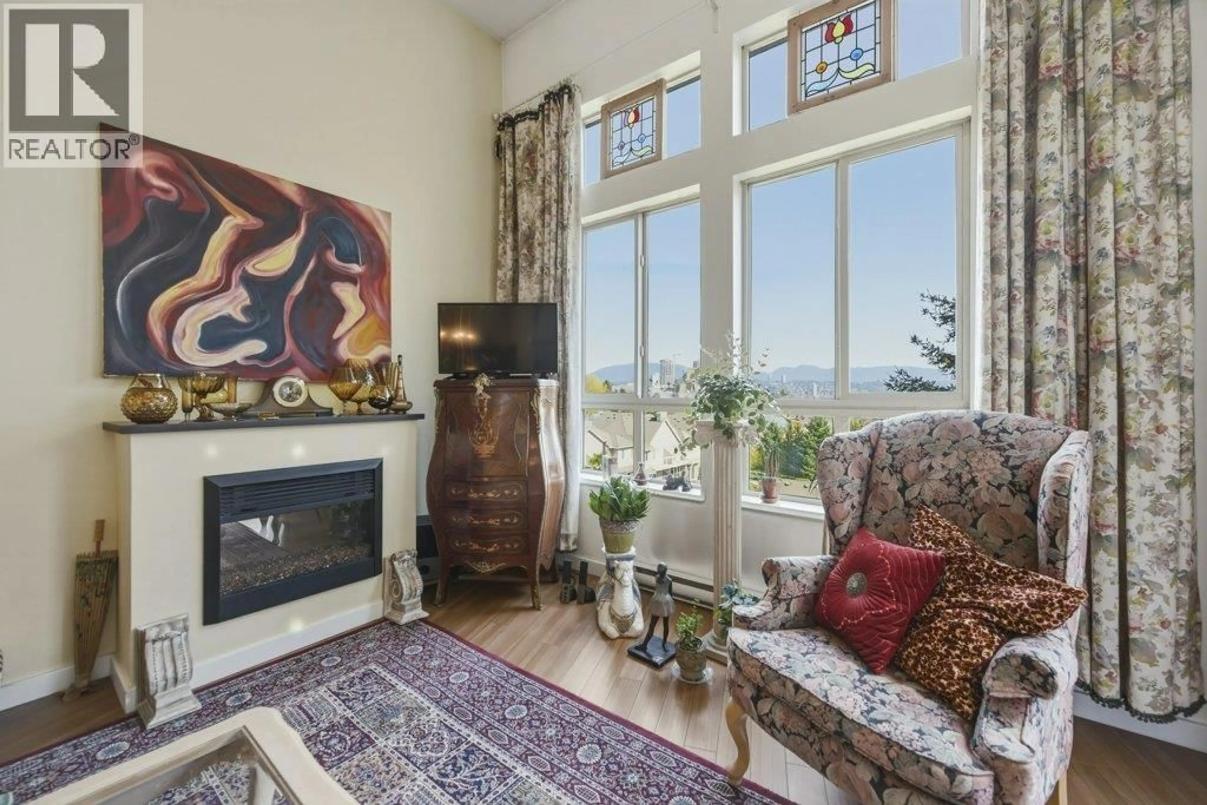 Living room with furniture, unknown for 409 - 225 FRANCIS WAY, New Westminster British Columbia V3L0G1