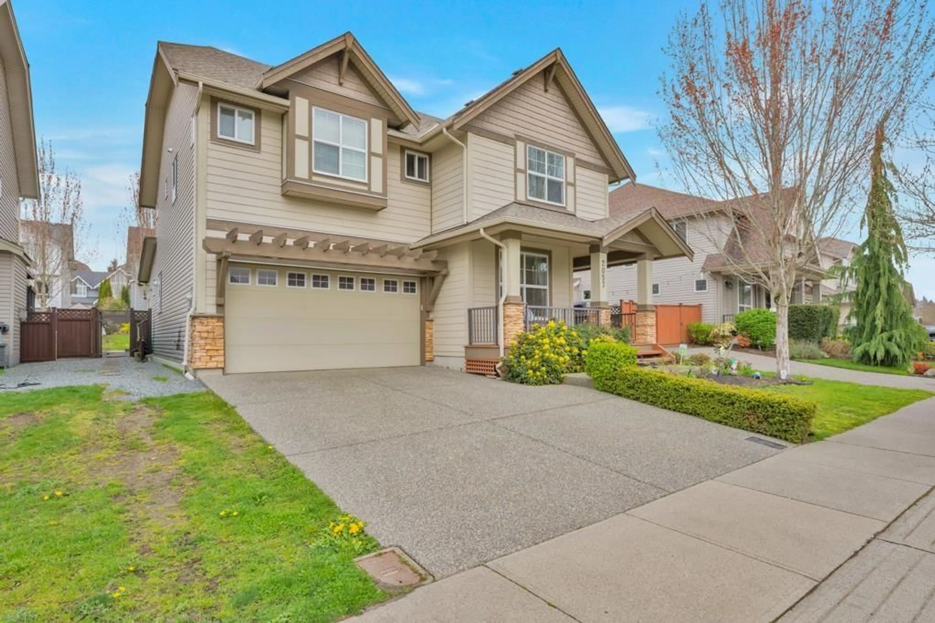 Home with vinyl exterior material, street for 2057 MERLOT BOULEVARD, Abbotsford British Columbia V4X0A6