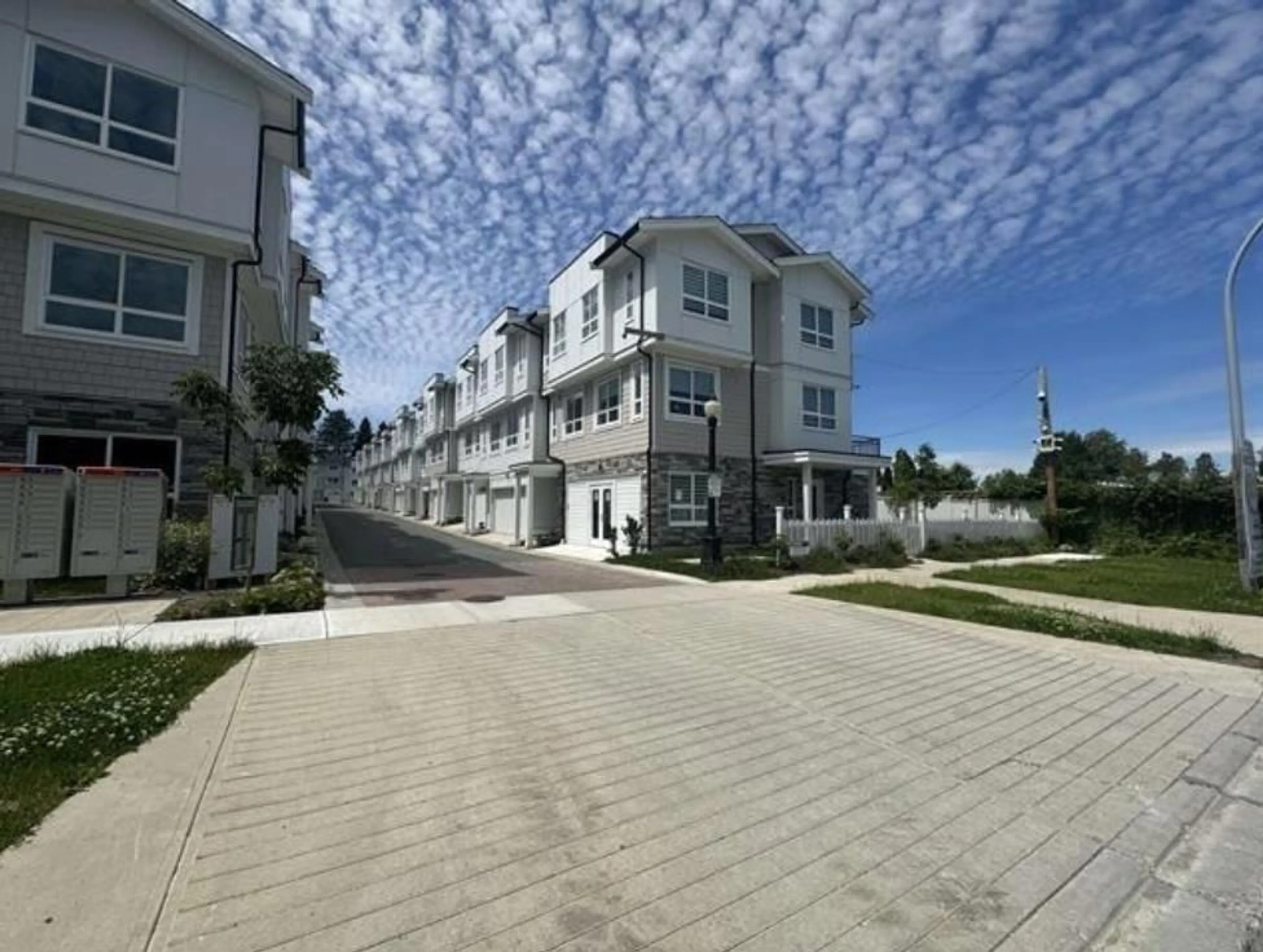 A pic from outside/outdoor area/front of a property/back of a property/a pic from drone, street for 7 - 8181 135A STREET, Surrey British Columbia V3W3N8