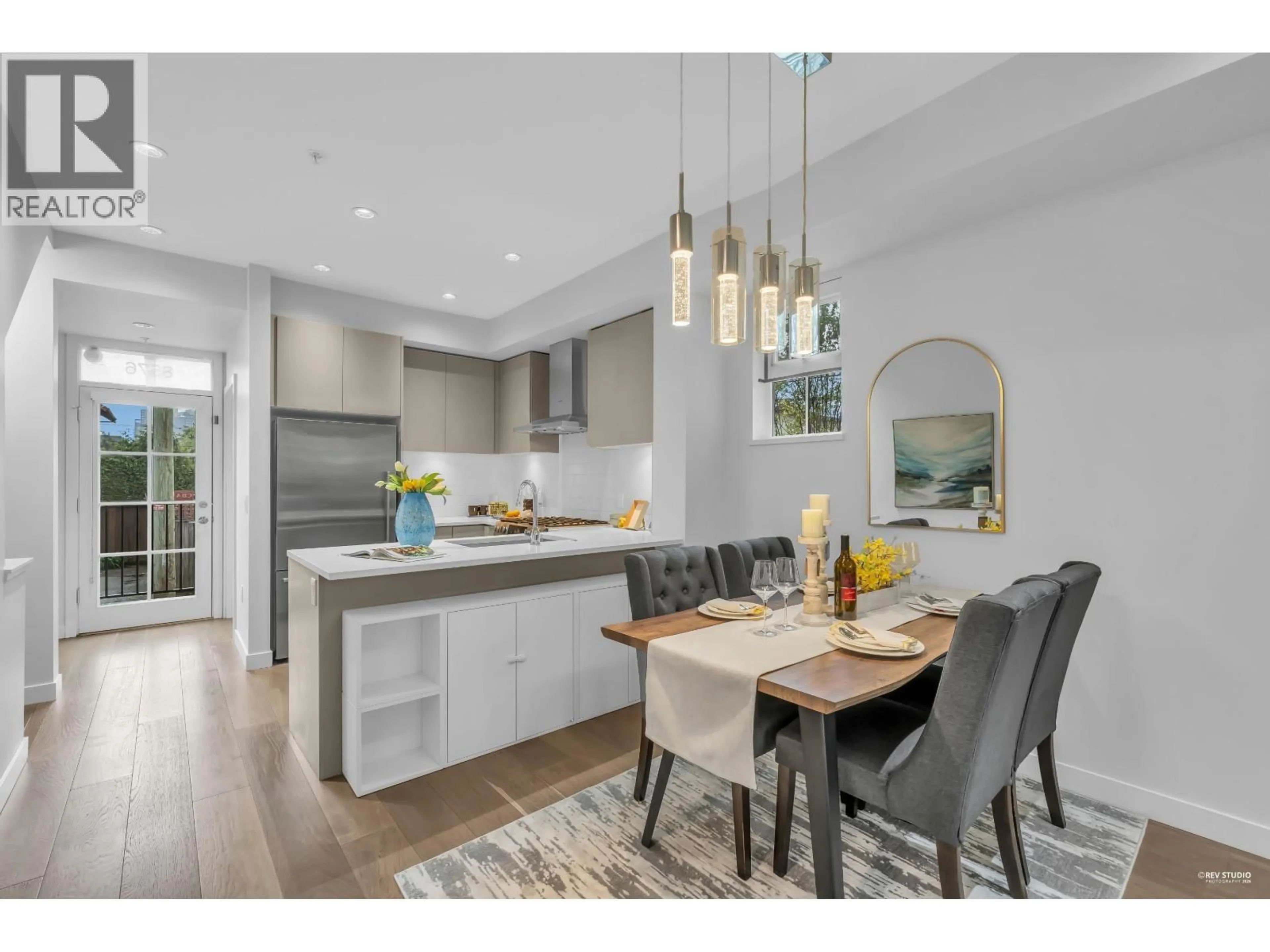 Open concept kitchen, wood/laminate floor for 8576 OSLER STREET, Vancouver British Columbia V6P0G4