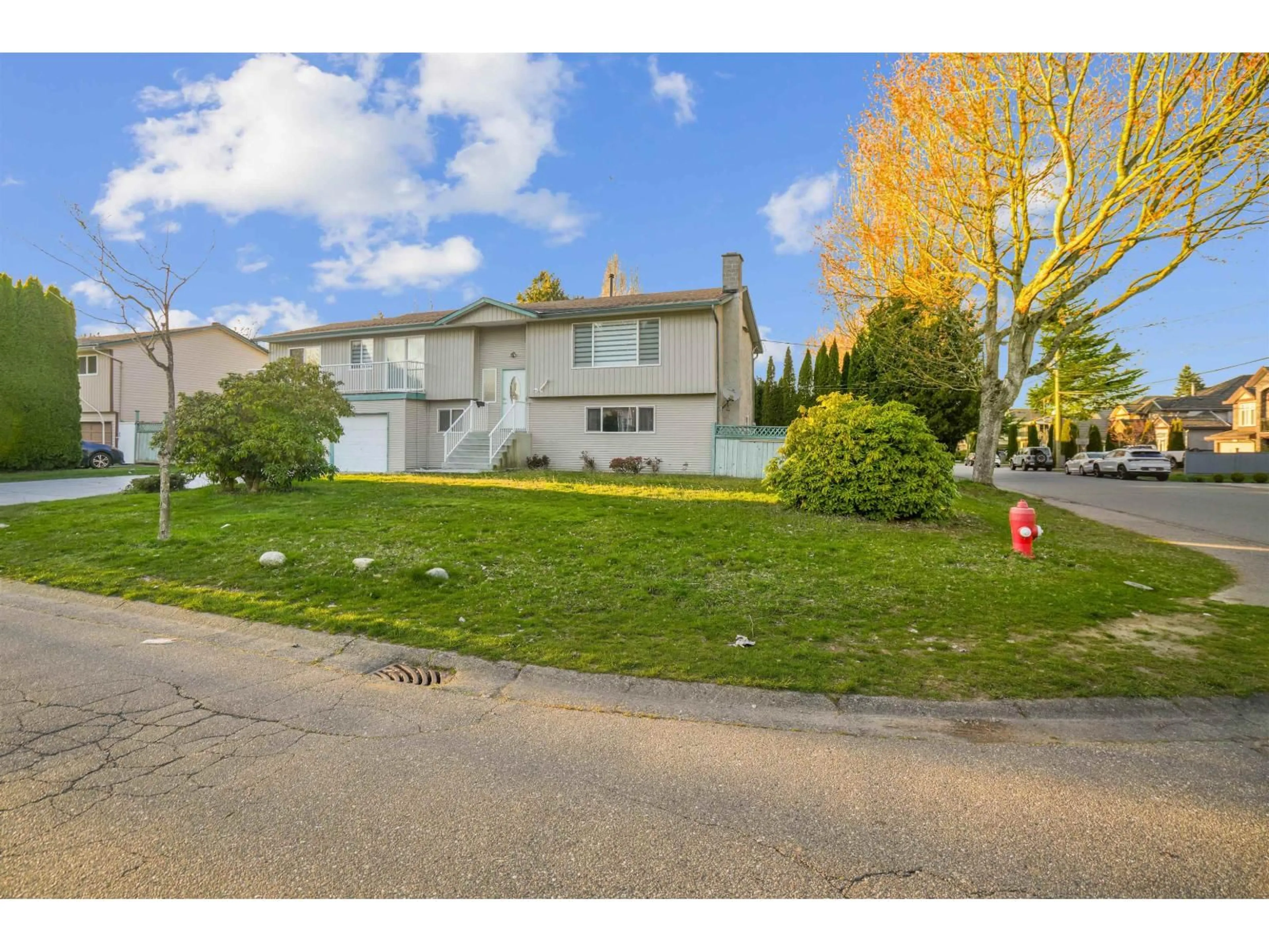 Home with vinyl exterior material, street for 12987 62 AVENUE AVENUE, Surrey British Columbia V3X2E9