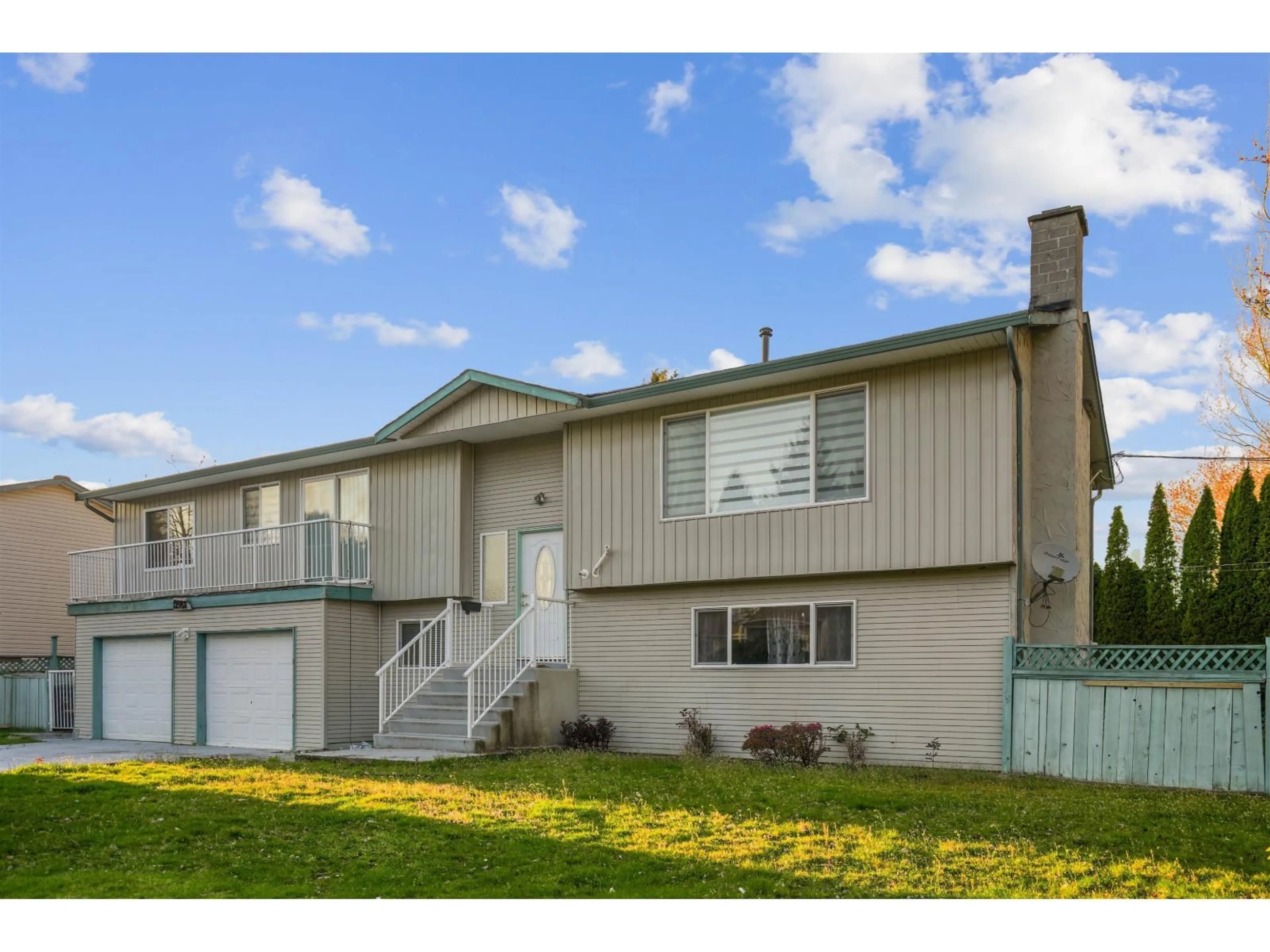 Home with vinyl exterior material, street for 12987 62 AVENUE AVENUE, Surrey British Columbia V3X2E9