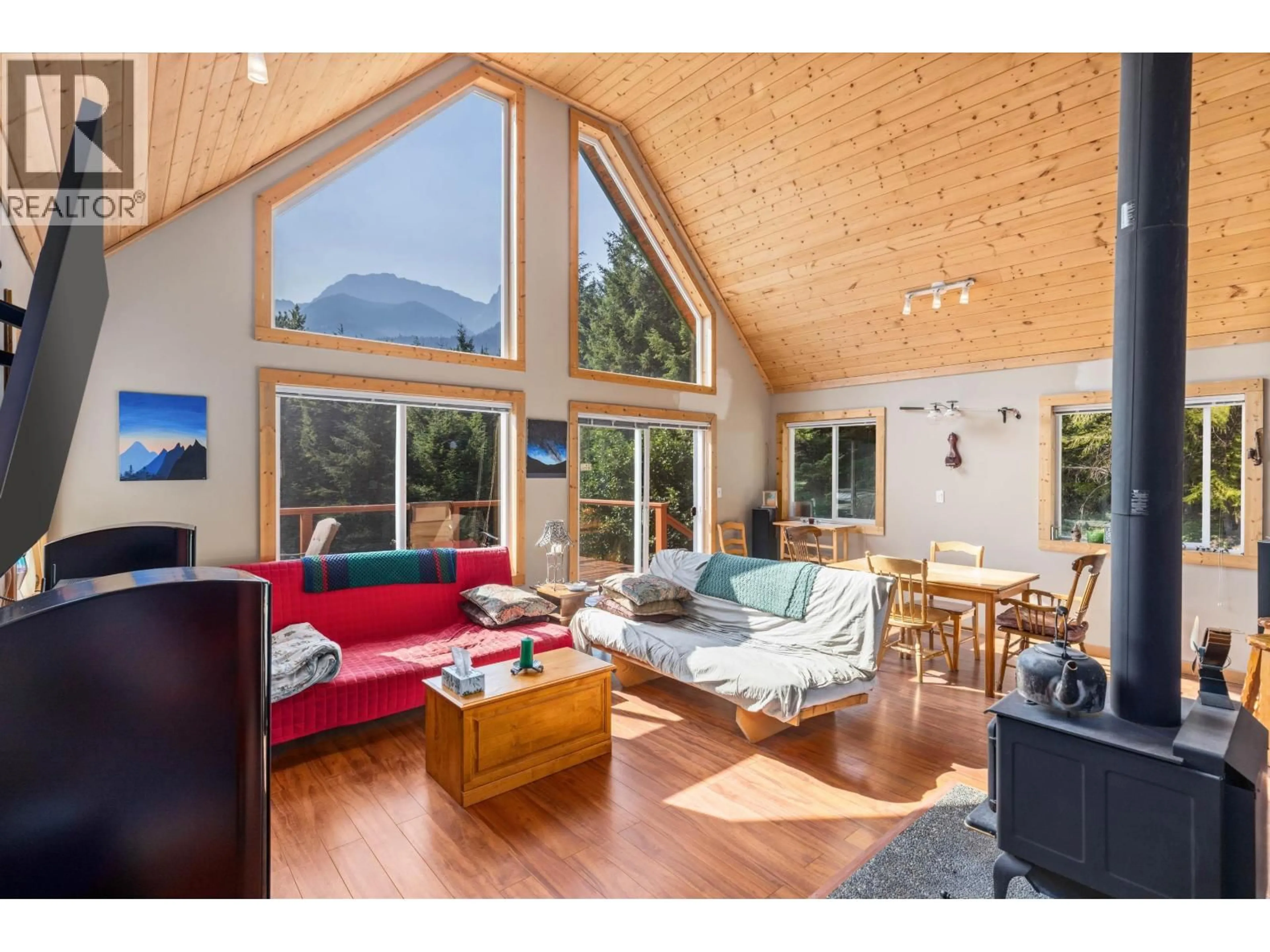 Living room with furniture, wood/laminate floor for 2873 BLACKWATER ROAD, D'Arcy British Columbia V0N1L0